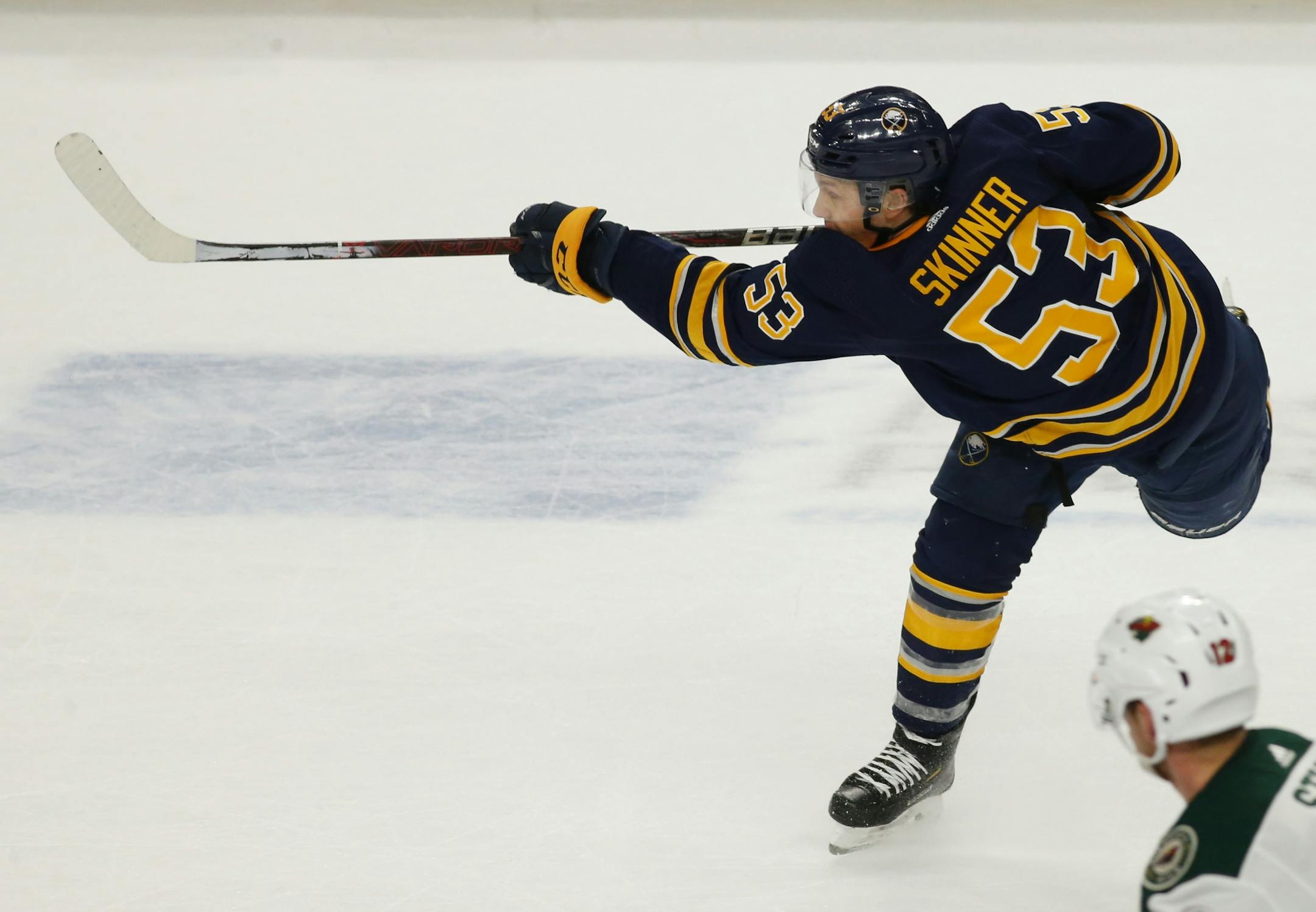 Buffalo Sabres forward Jeff Skinner (53) takes a shot during the third period of an NHL hockey game against the Minnesota Wild, Tuesday, Feb. 5, 2019, in Buffalo N.Y.