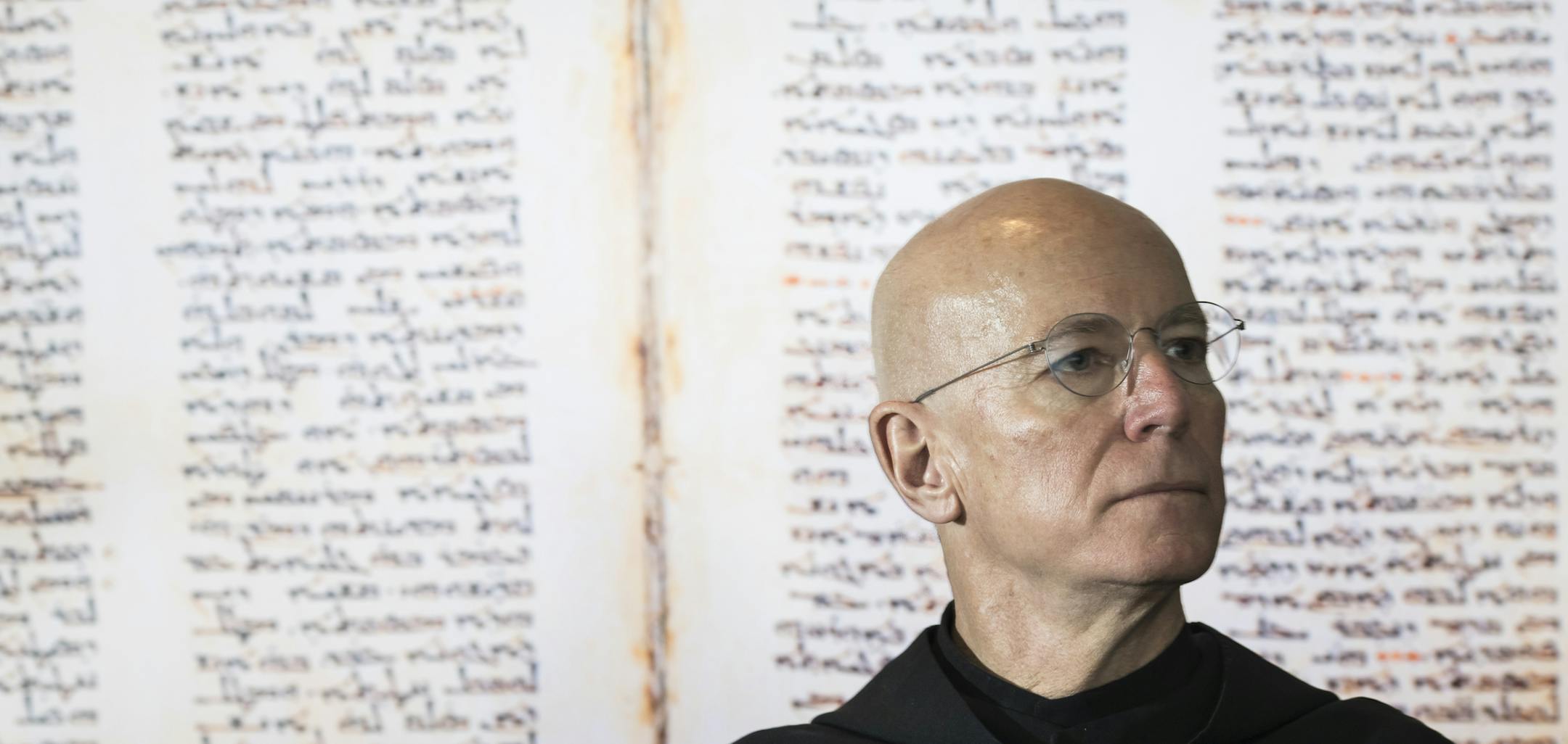 A possibly lost manuscript in Syriac was digitized before the library that housed it was burned. Fr. Columba Stewart sat in front of the digital image he created during one of his many travels while in his office at St. John's University in Collegeville, Minn., on Friday, December 1, 2017. ] RENEE JONES SCHNEIDER &#x2022; renee.jones@startribune.com