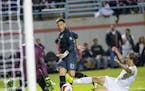 Minnesota United FC's Christian Ramirez took a shot to score the only goal in the Loons' 1-0 victory over the New York Cosmos on Saturday night.