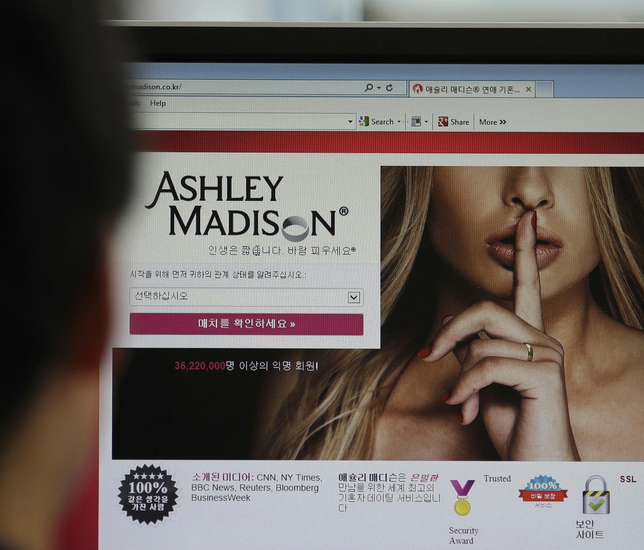 FILE - A June 10, 2015 photo from files showing Ashley Madison's Korean web site on a computer screen in Seoul, South Korea.