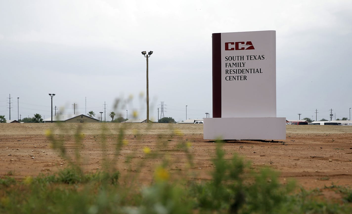 File-This June 30. 2015, file photo shows a sign at the entrance to the South Texas Family Residential Center in Dilley, Texas. Authorities say about 250 immigrant children were given an adult dose of a Hepatitis A vaccine at a Texas detention facility where they are being held with their mothers. U.S. Immigration and Customs spokesman Richard Rocha says health care professionals will monitor the children over the next five days for any potential side effects, though no adverse reactions are exp