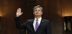 FBI Director nominee Christopher Wray is sworn-in on Capitol Hill in Washington, Wednesday, July 12, 2017, prior to testifying at his confirmation hea