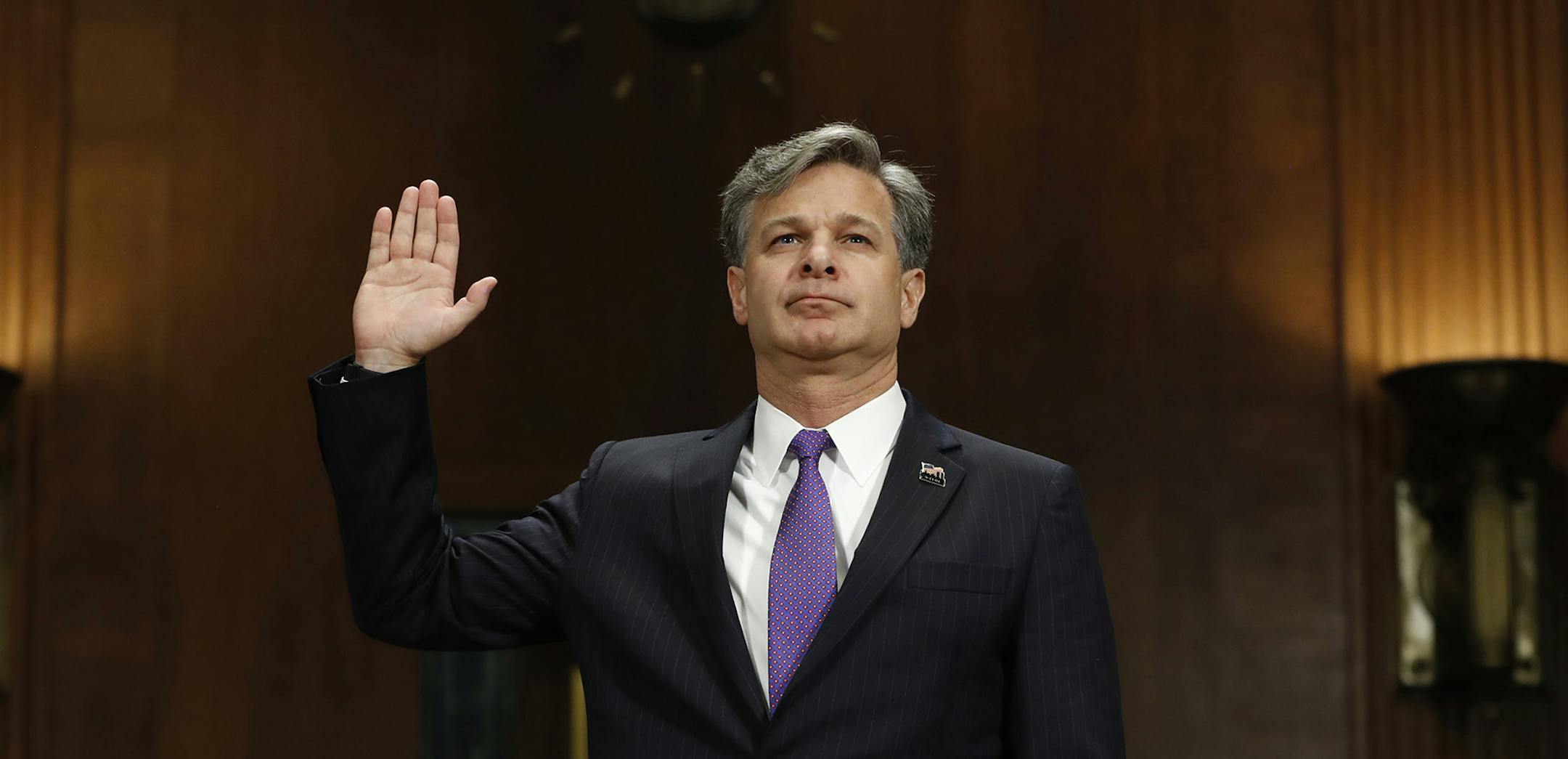 FBI Director nominee Christopher Wray is sworn-in on Capitol Hill in Washington, Wednesday, July 12, 2017, prior to testifying at his confirmation hearing before the Senate Judiciary Committee. (AP Photo/Pablo Martinez Monsivais) ORG XMIT: MIN2017071313443316