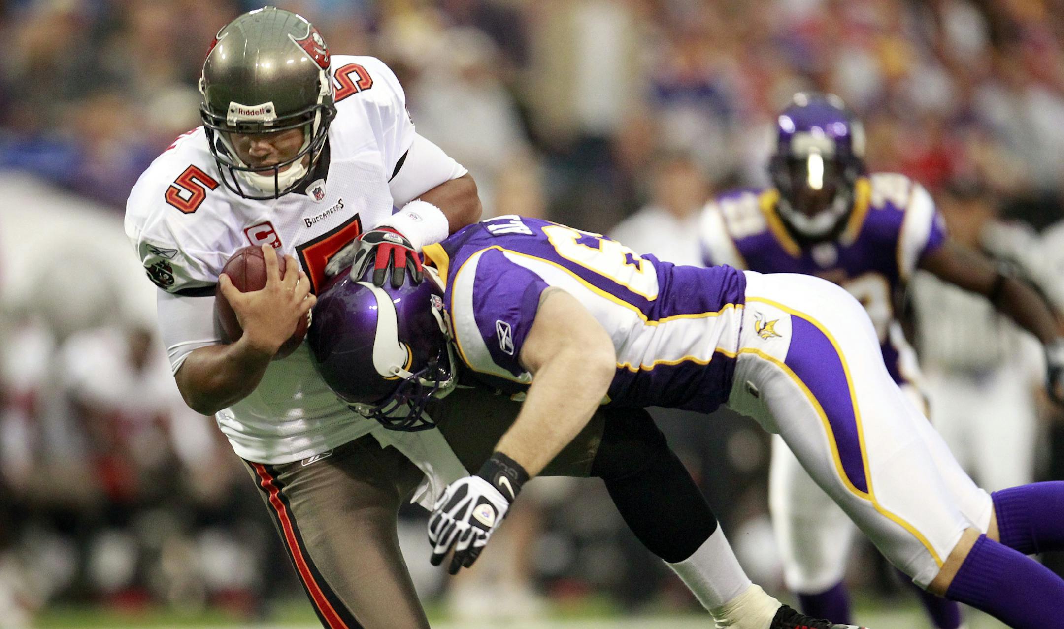 Jared Allen (69) sacked Josh Freeman (5) in the first quarter. ] CARLOS GONZALEZ cgonzalez@startribune.com , September 18, 2011, Minneapolis, Minn, Mall of America Field , Metrodome , NFL , Minnesota Vikings vs. Tampa Bay Buccaneers ORG XMIT: MIN2013100620485241