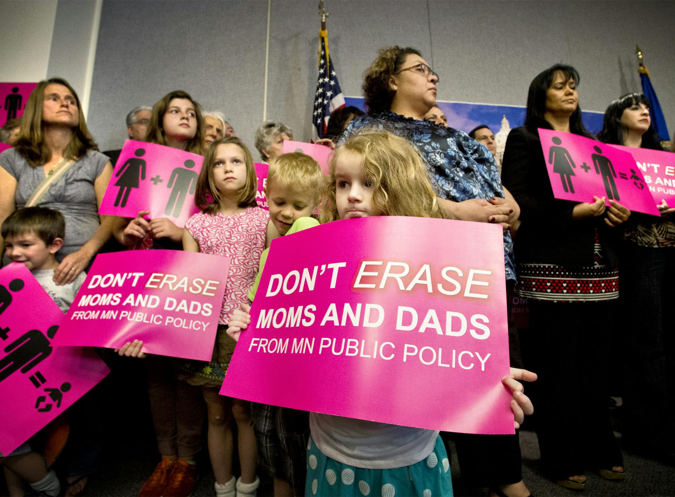 Monica Trojack, 5, of St. Paul, center attended the conference. Minnesota For Marriage, opponents of same sex marriage held a news conference claiming that religious protections in the Minnesota proposal are inadequate, leaving business owners and religious groups wide open to lawsuits if they fail to embrace same-sex marriage. Monday, May 6, 2013 ] GLEN STUBBE * gstubbe@startribune.com