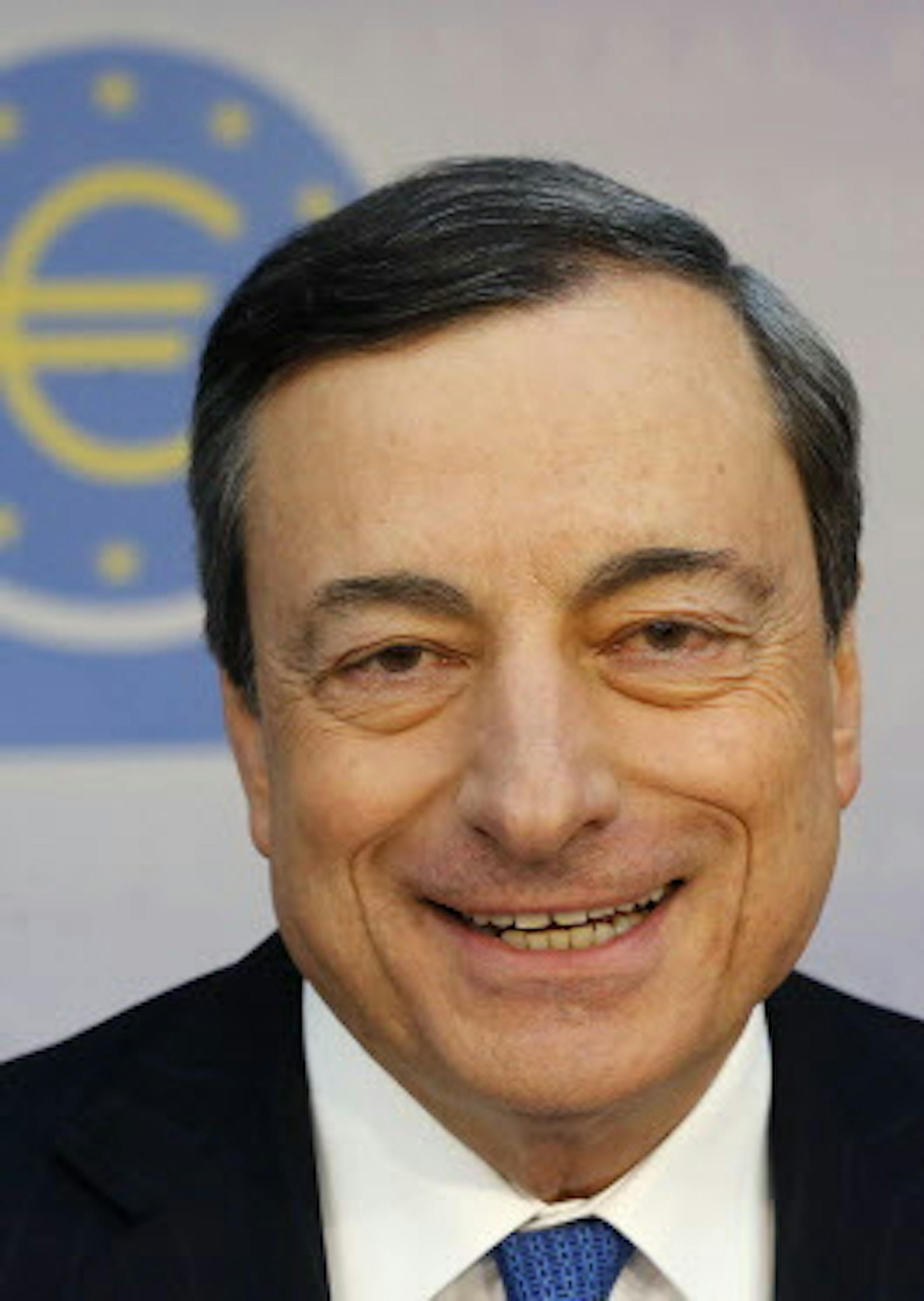 President of European Central Bank, Mario Draghi , waits for the beginning of a news conference in Frankfurt, Germany, Thursday, June 5, 2014,. The European Central Bank has cut two key interest rates, one of them into negative territory ó a highly unusual step that underlines the urgency of its efforts to keep the eurozone economy from sliding into crippling deflation. It reduced its main interest rate, the refinancing rate, from a record low of 0.25 percent to 0.15 percent. More drastical