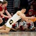 Purdue star Zach Edey (15) drew a foul against Wisconsin's Steven Crowl during last Saturday's overtime loss to Wisconsin in the Big Ten tournament se