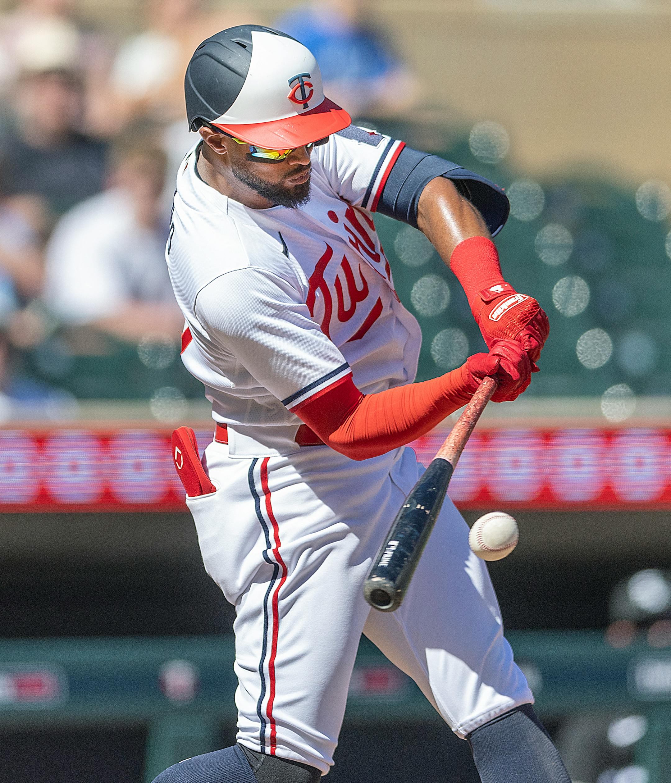 Minnesota Twins right fielder Willi Castro (50) makes contact with the ball for an RBI double during the bottom of the eighth inning.