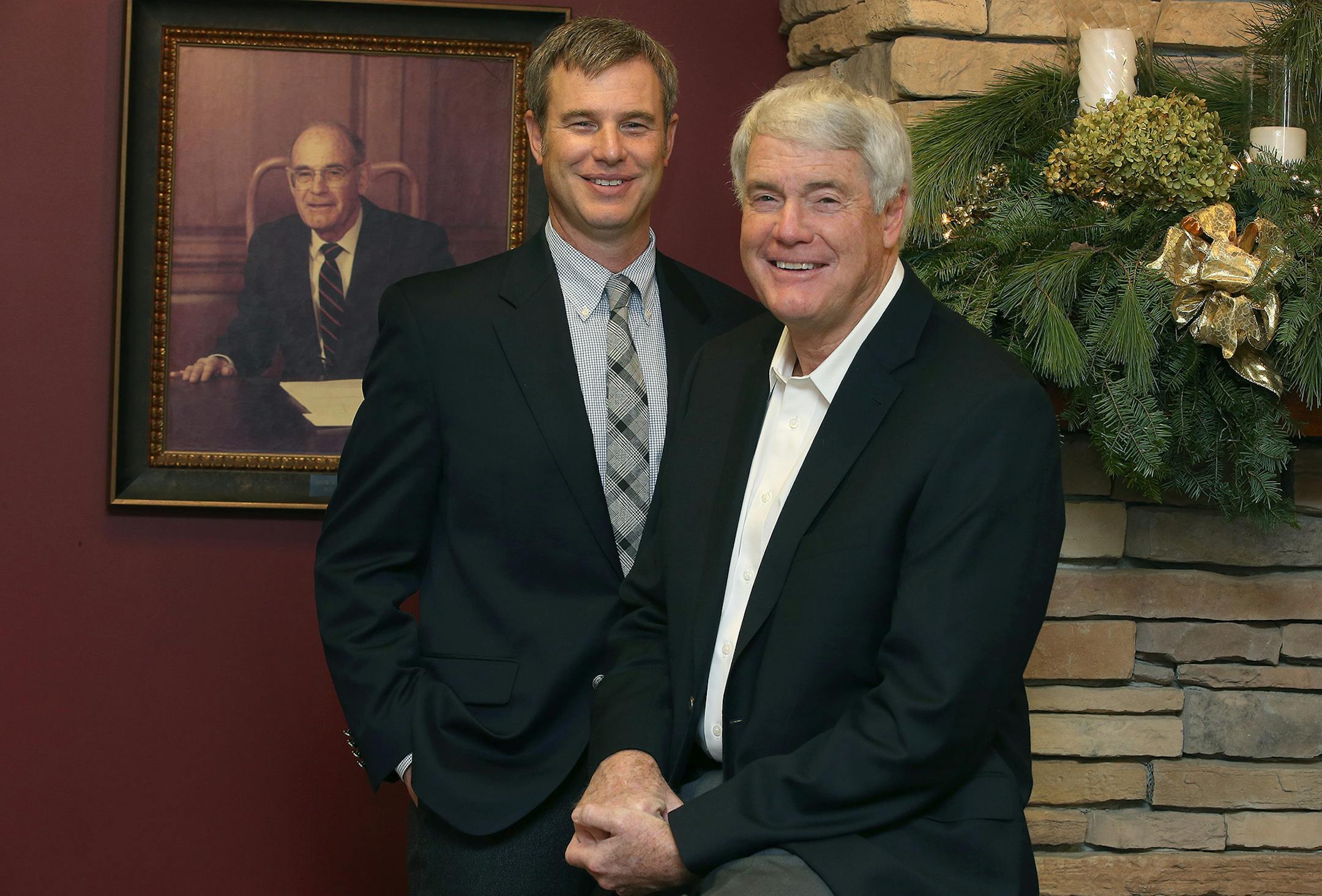 Andy Fazendin, left, and his father Dan Fazendin at Roger Fazendin Realtors, Wednesday, December 3, 2014 in Wayzata, MN. It is the state's largest independent family owned real estate brokerage, which is in the midst of big changes as the third generation of the company takes over. ] (ELIZABETH FLORES/STAR TRIBUNE) ELIZABETH FLORES • eflores@startribune.com