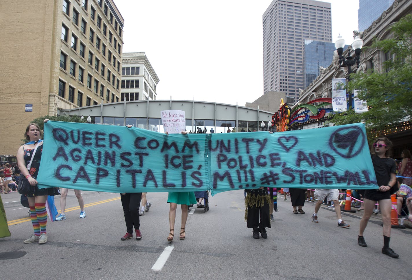 Protestors marched ahead of the pride parade on Sunday to call attention to misconduct by police and the death of black community members. ] ALEX KORMANN &#x2022; alex.kormann@startribune.com A few dozen protestors delayed the pride parade on Sunday. The protestors called for the removal of all police during the parade. They also chanted the names of numerous black community members who died in police shootings. The protestors marched down the same route of the parade to reach as large of an aud