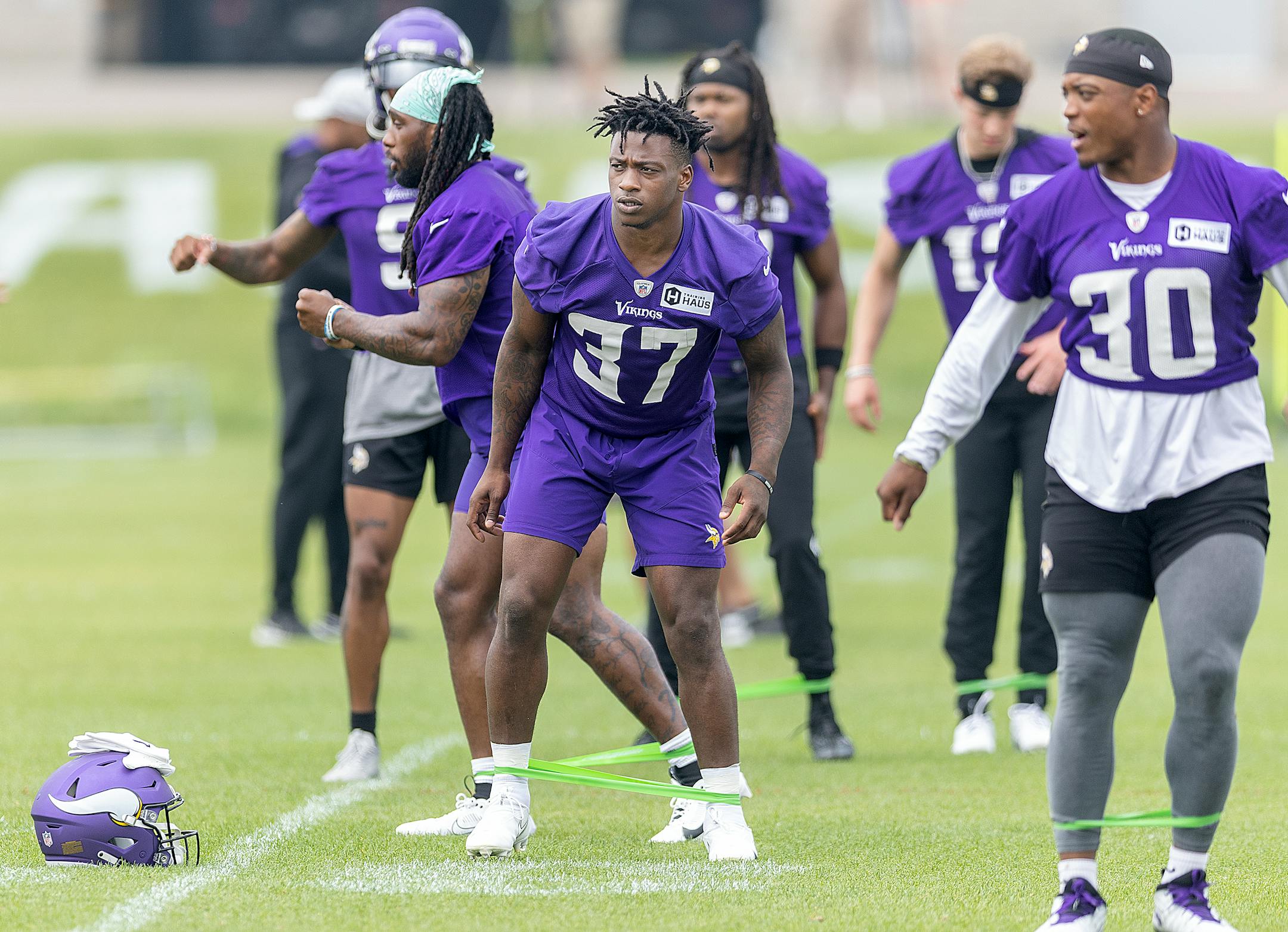 Vikings running back DeWayne McBride stretches before practice at the TCO Performance Center in Eagan, Minn., on Tuesday, June 6, 2023.