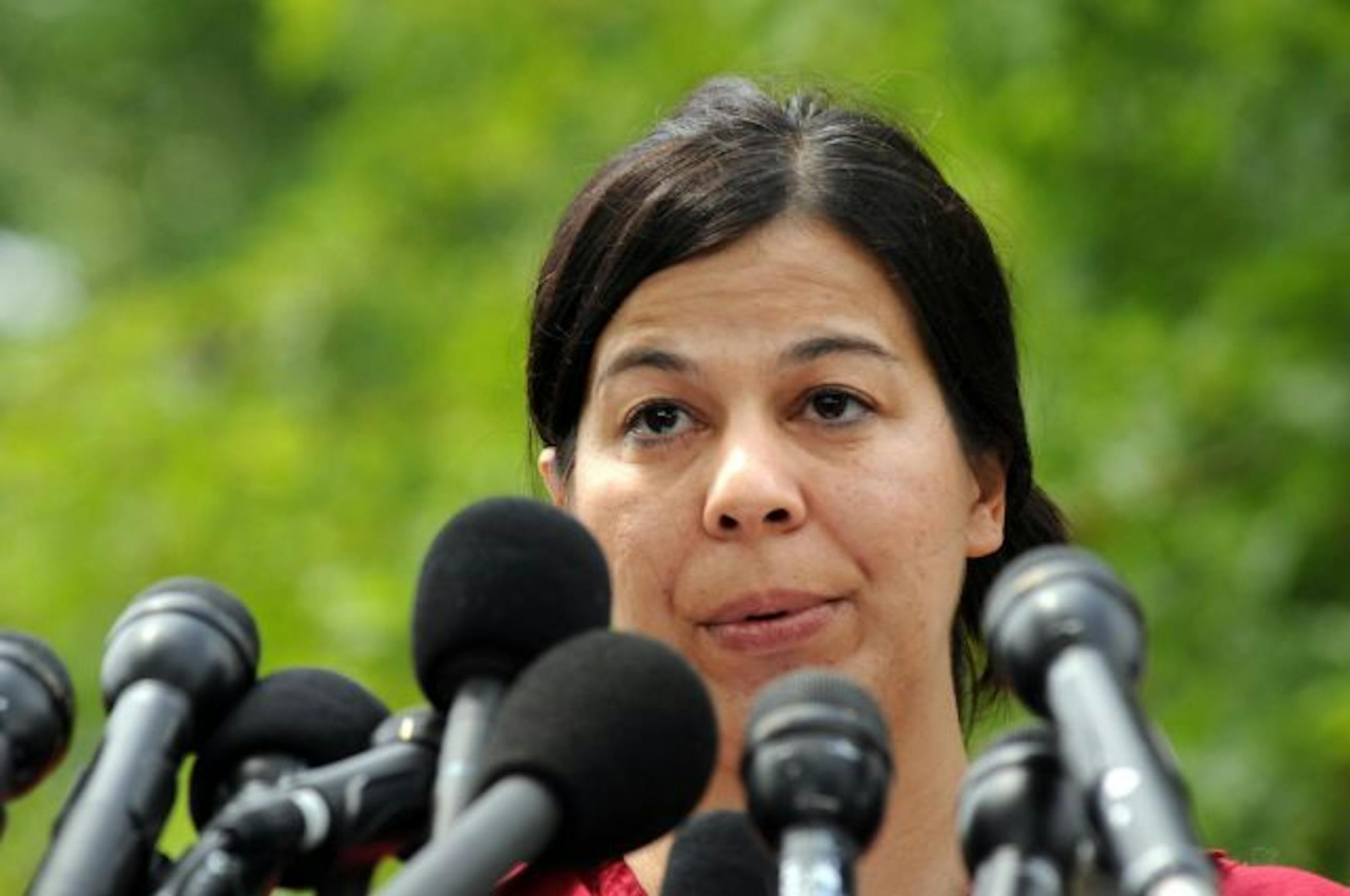 CAMBRIDGE, MA - JULY 29: Lucia Whalen, whose 911 call brought police to the home of Harvard University professor Henry Louis Gates Jr., speaks at a press conference July 29, 2009 at Daheny Park July 29, 2009 in Cambridge, Massachusetts. The 911 call and Gates' subsequent arrest by Cambridge police, set of a storm of controversy on race relations that U.S. President Barack Obama to commented on during a press conference.