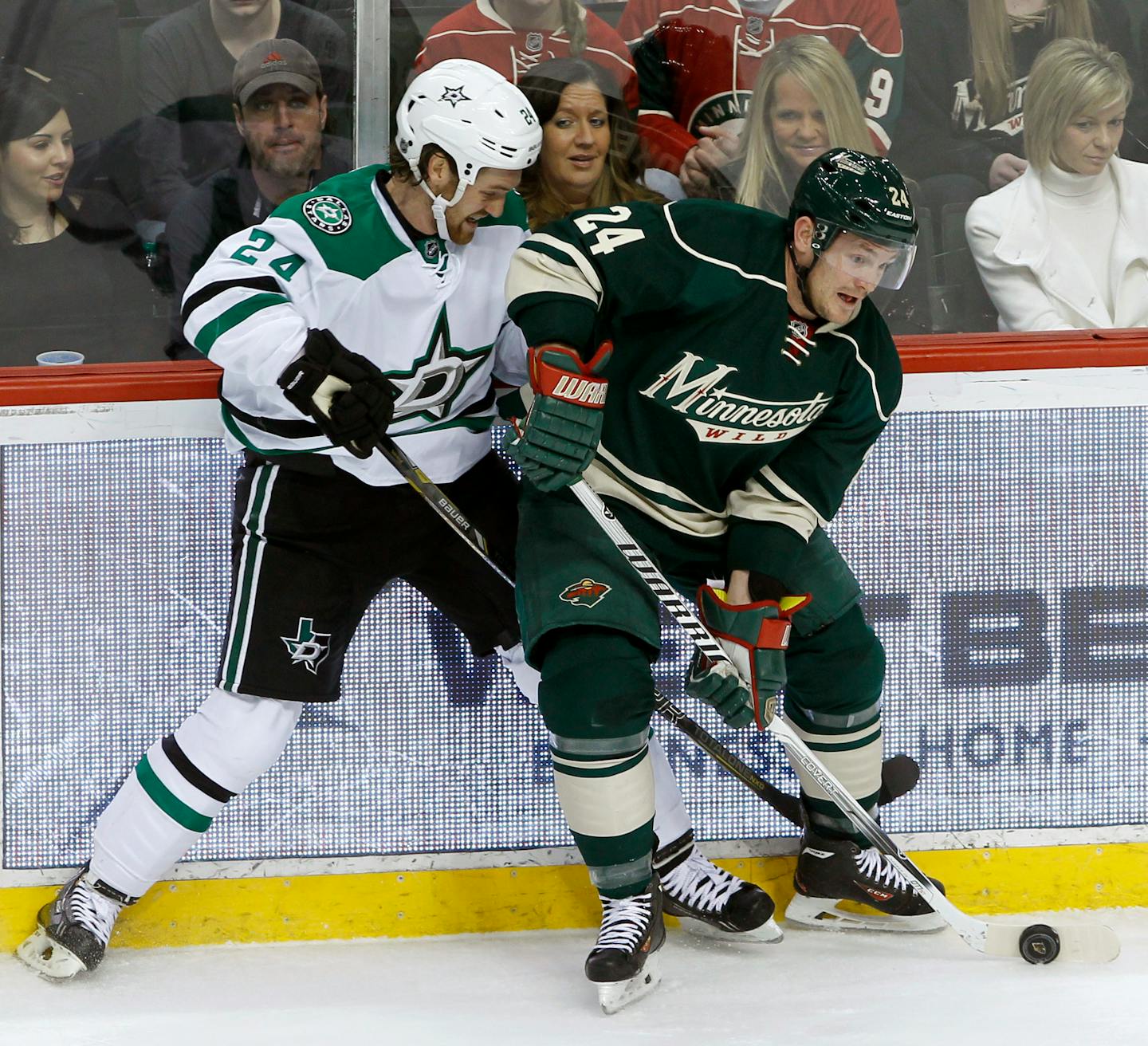 Wild left winger Matt Cooke, right