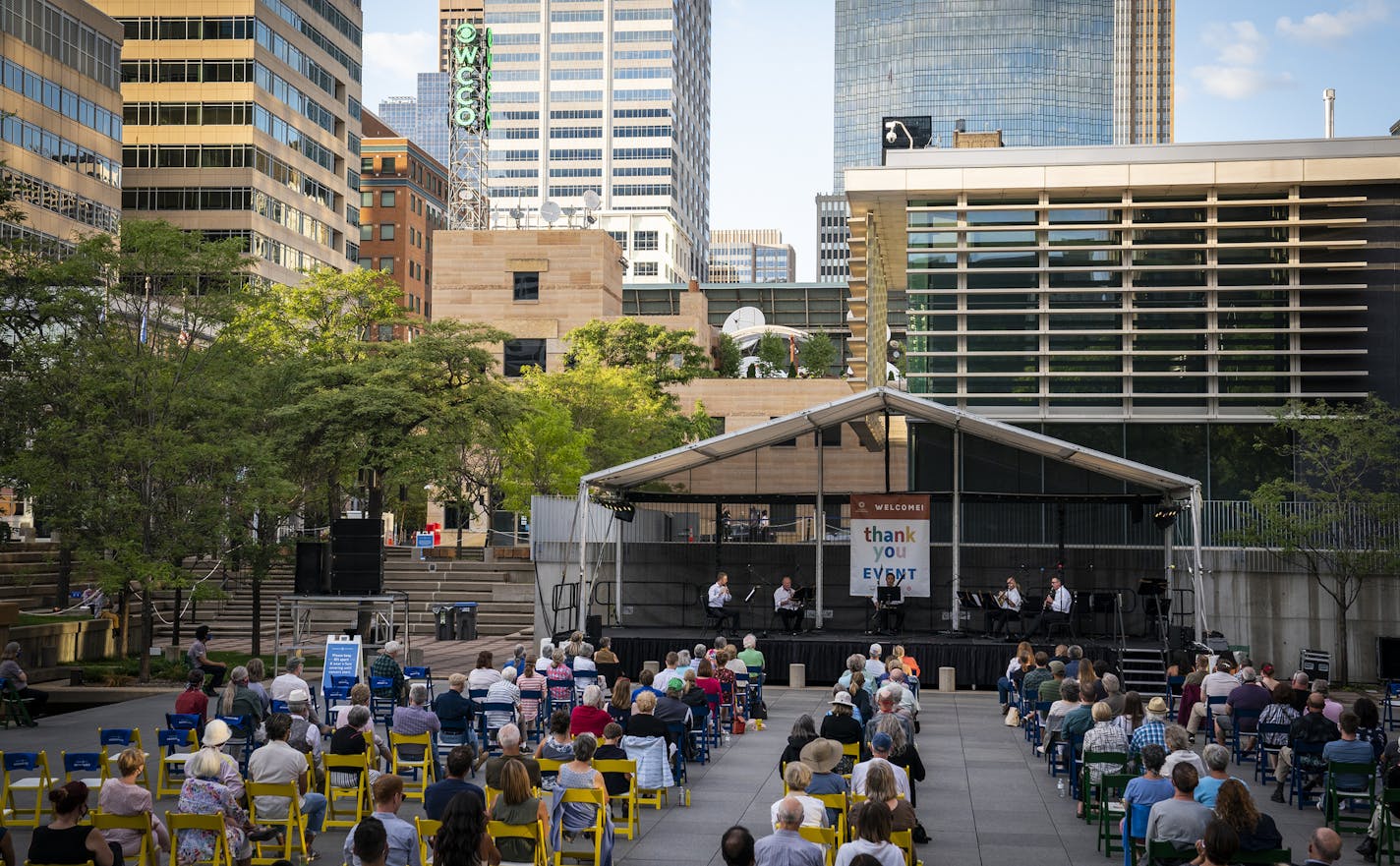 A woodwinds quartet played Valerie Coleman's "Tzigane for Wind Quintet" during an outdoor Minnesota Orchestra concert in Peavey Plaza. ] LEILA NAVIDI • leila.navidi@startribune.com BACKGROUND INFORMATION: Minnesota Orchestra presented their first concert since March 13 in Peavey Plaza in downtown Minneapolis on Tuesday, August 4, 2020.