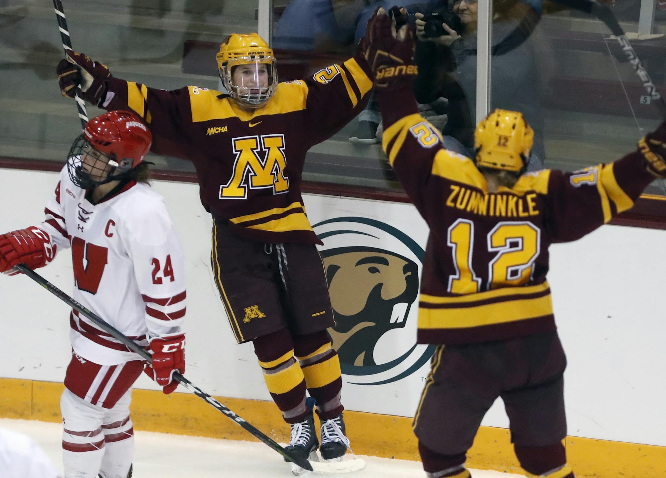 Emily Brown(2) and Grace Zumwinkle(12) celebrate the Gophers' third goal.]Gophers play the Badgers for the women's hockey WCHA Final Faceoff Championship at Ridder Arena.Richard Tsong-Taatariiïrtsong-taatarii@startribune.com