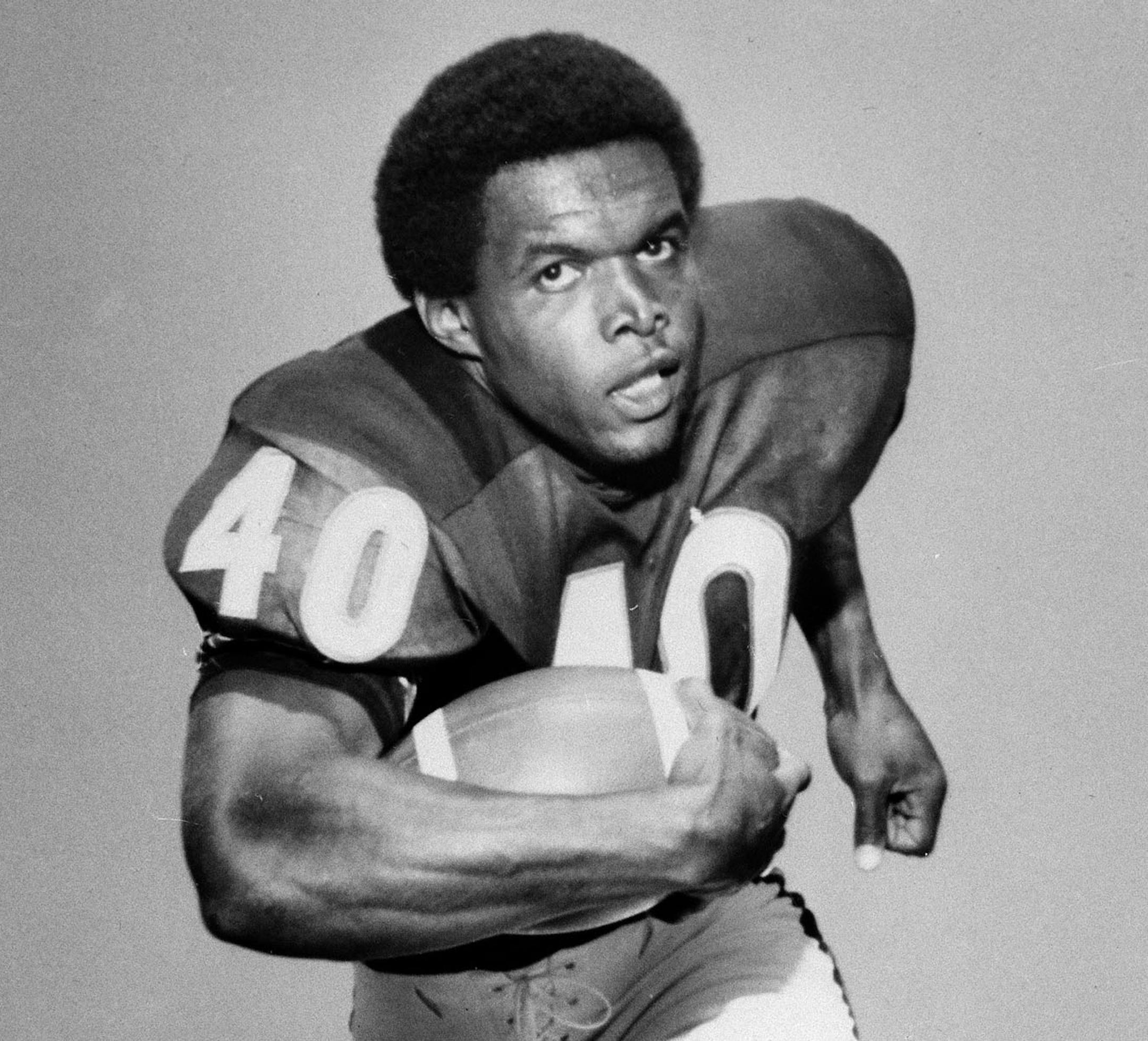 FILE - In this Sept. 1968, file photo, Chicago Bears' halfback Gale Sayers runs with the ball. Relatives of Pro Football Hall of Famer Gale Sayers say the Bears legend has been diagnosed with dementia. His wife, Ardythe Sayers, tells The Kansas City Star that her 73-year-old husband was diagnosed four years ago and she blames Sayers’ football career. He played for the Bears from 1965-71 after setting records at the University of Kansas. (AP Photo/File)