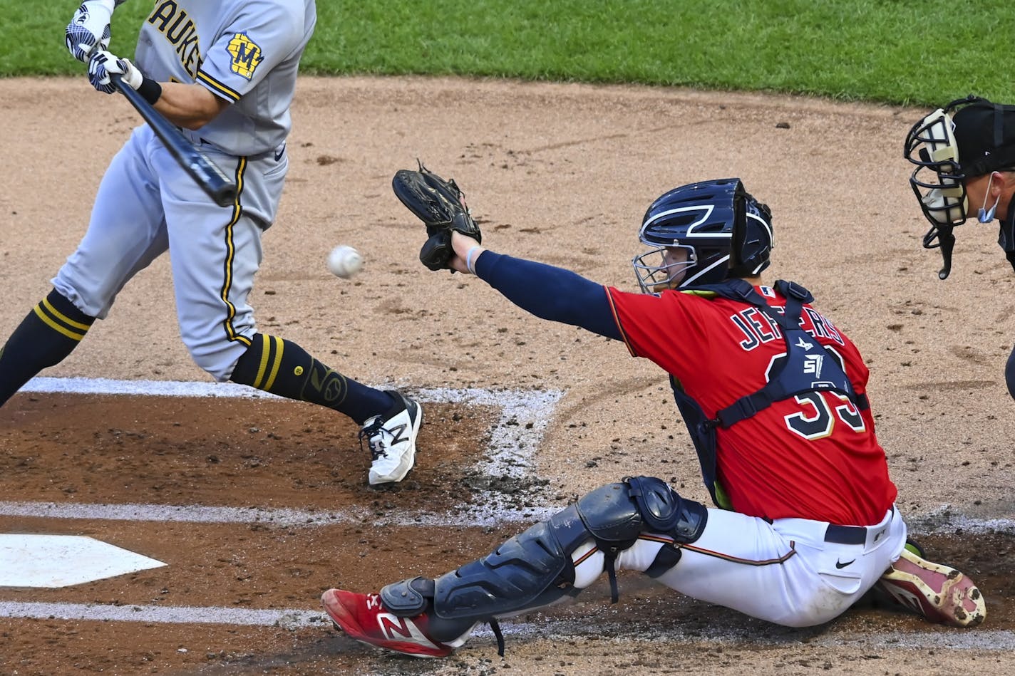 Twins catcher Ryan Jeffers caught the ball during his MLB debut Thursday night against the Milwaukee Brewers.