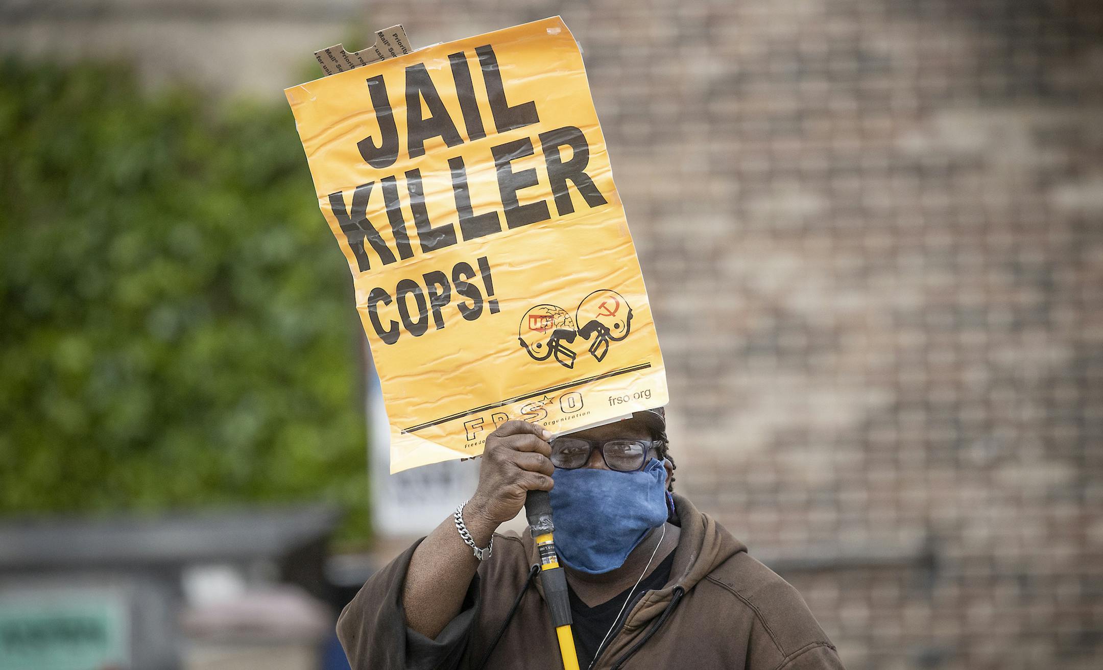 Steven Hudson protests, Tuesday, May 26, 2020, in Minneapolis, near the site where a black man, who was taken into police custody the day before, later died. The FBI and Minnesota agents are investigating the death of a black man in Minneapolis police custody after video from a bystander showed a white officer kneeling on his neck during his arrest as he pleaded that he couldn't breathe. (Elizabeth Flores/Star Tribune via AP)