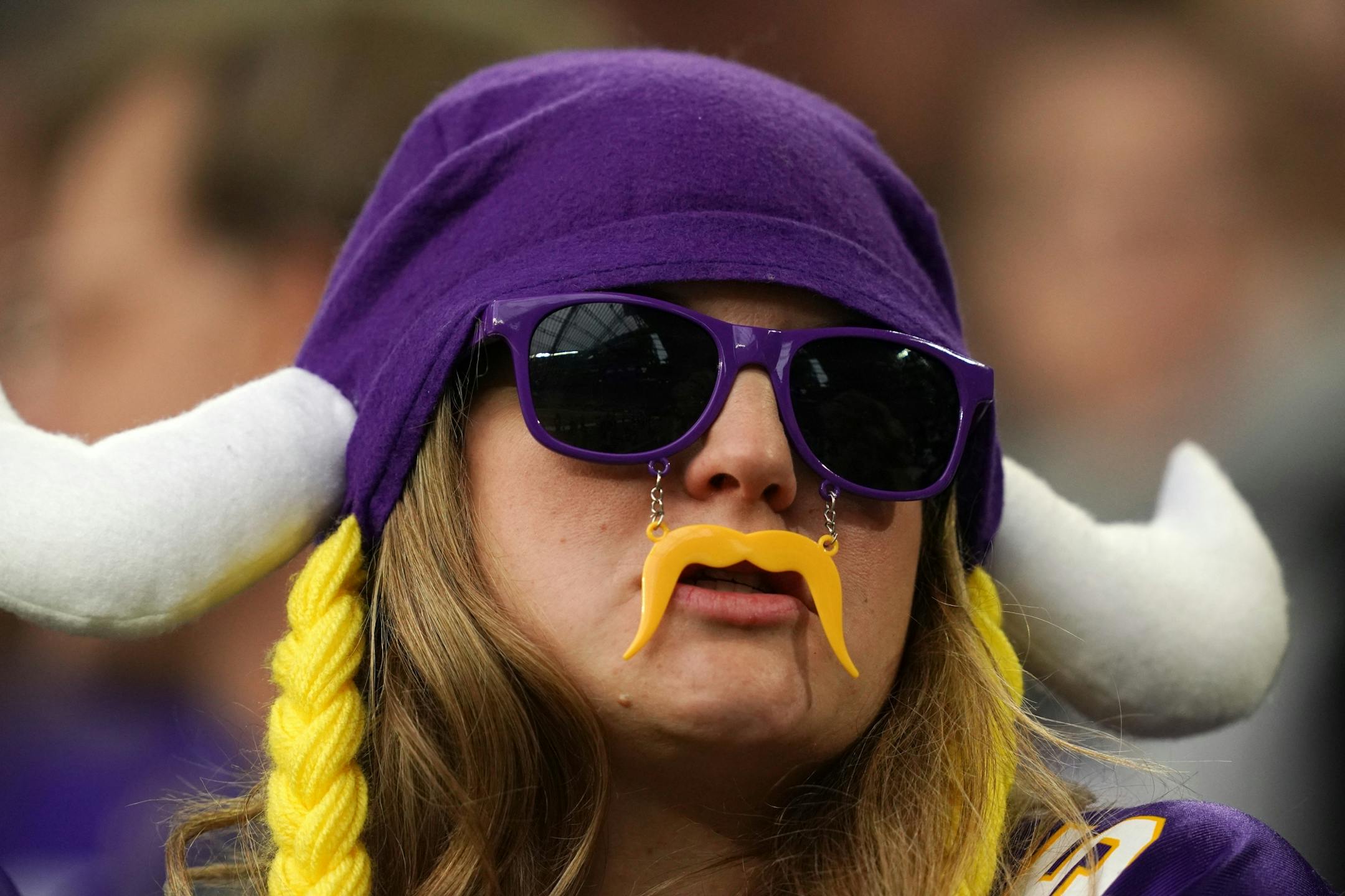 A Minnesota Vikings fan watched from the stands during a recent game.