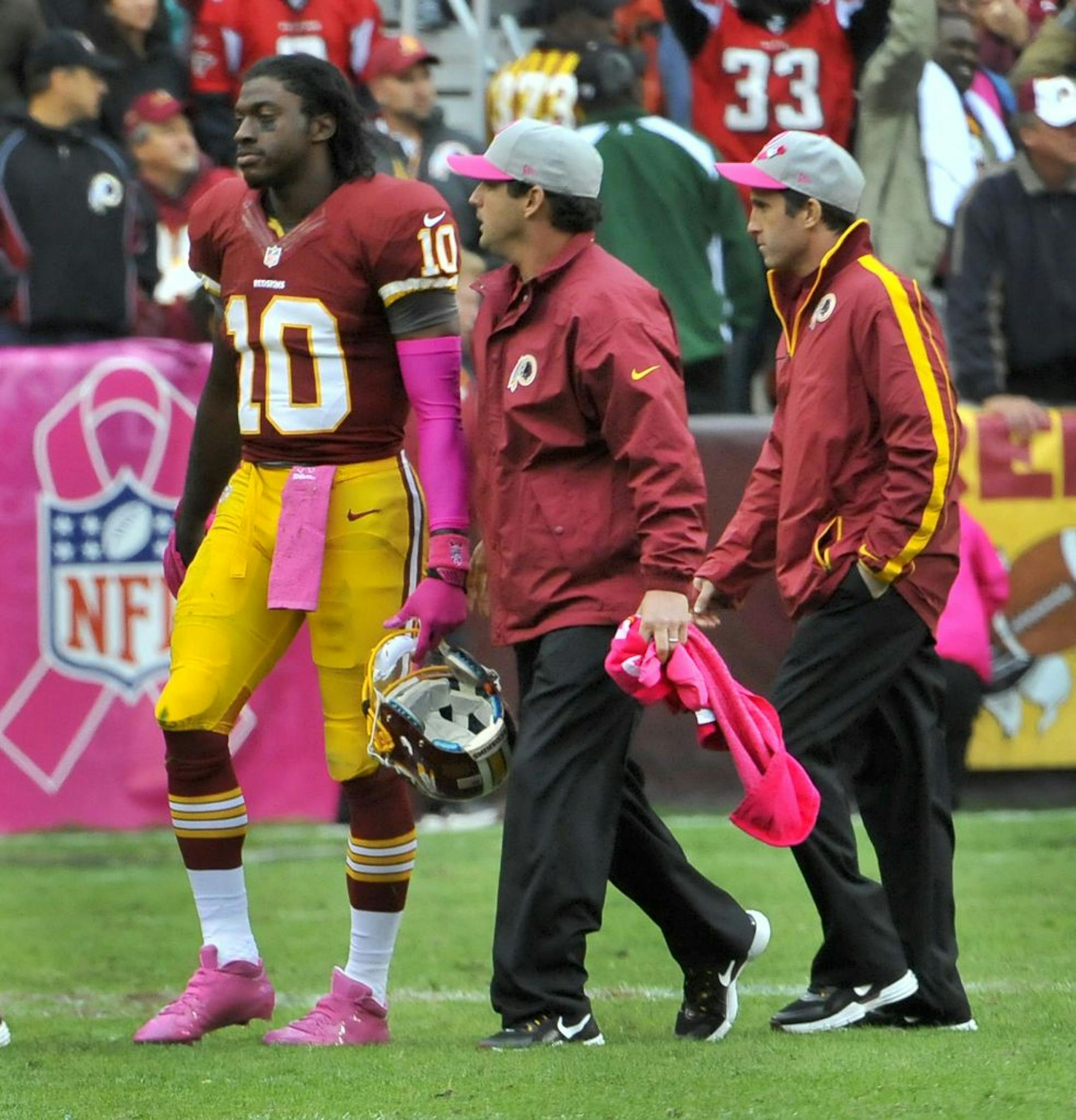 Washington Redskins quarterback Robert Griffin III (10) walks off the field after being sacked and injured against the Atlanta Falcons during the second half at FedEx Field in Landover, MD, Sunday, October 7, 2012. Atlanta defeated Washington 24-17.