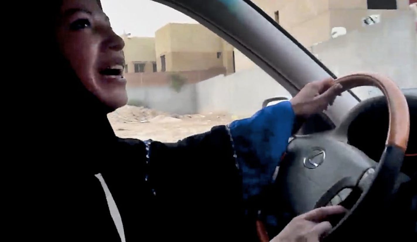 In this image made from video released by Change.org, a Saudi Arabian woman drives a car as part of a campaign to defy Saudi Arabia's ban on women driving, in Riyadh, Saudi Arabia Friday, June 17, 2011. NO SALES