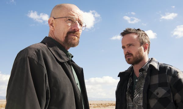 This image released by AMC shows Bryan Cranston as Walter White, left, and Aaron Paul as Jesse Pinkman in a scene from "Breaking Bad." he program was 