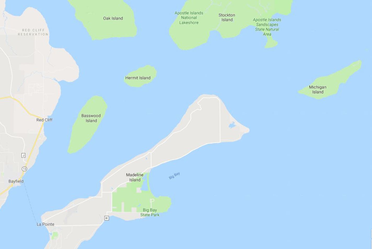 Madeline Island, Stockton Island and Michigan Island are pictured in Lake Superior. In a preliminary statement to rescuers, the mother said the family's vessel capsized between Stockton and Michigan islands.