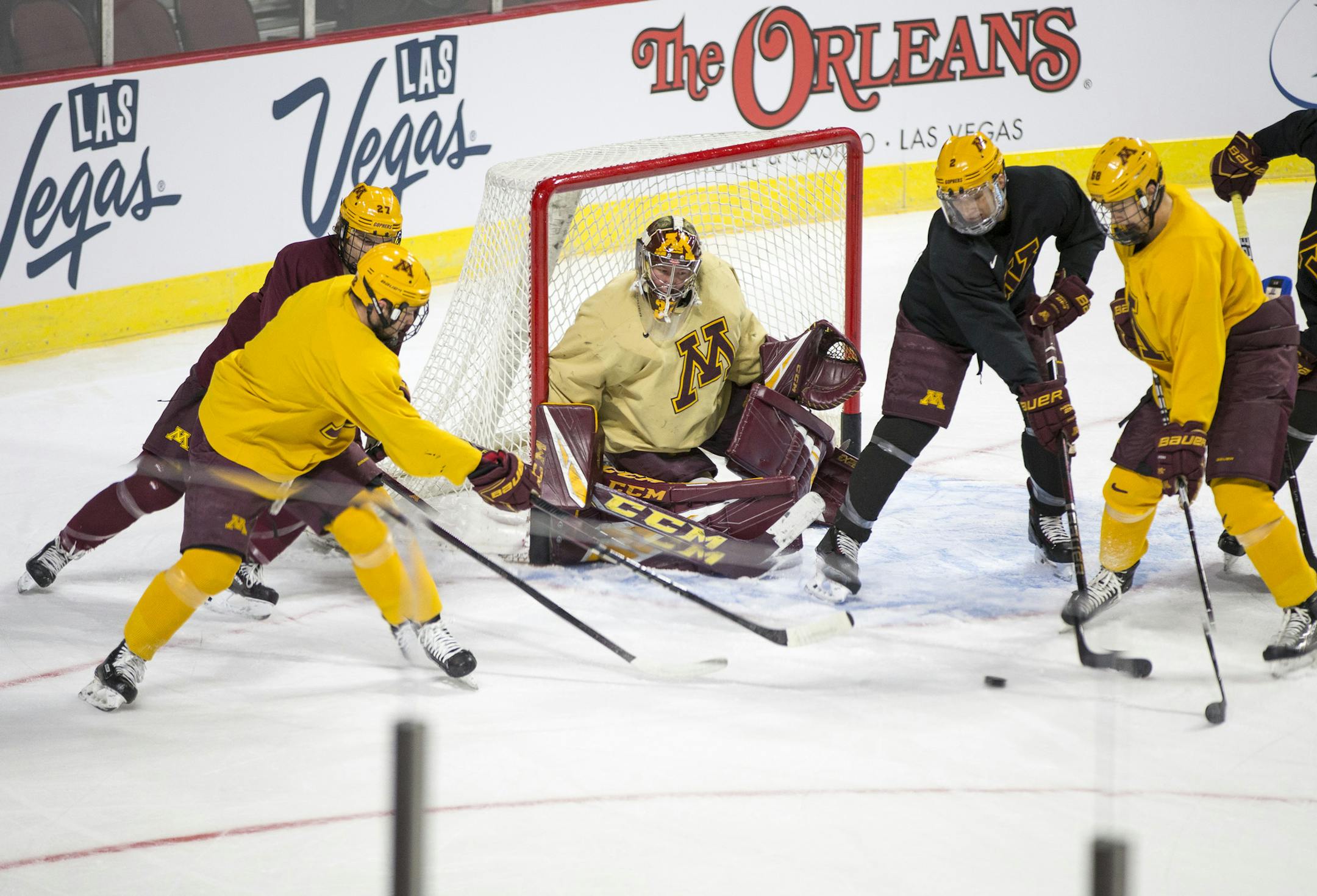 The Gophers run through drills during a team practice ahead of the U.S. Hockey Hall of Fame Game at the Orleans Arena in Las Vegas on Friday.