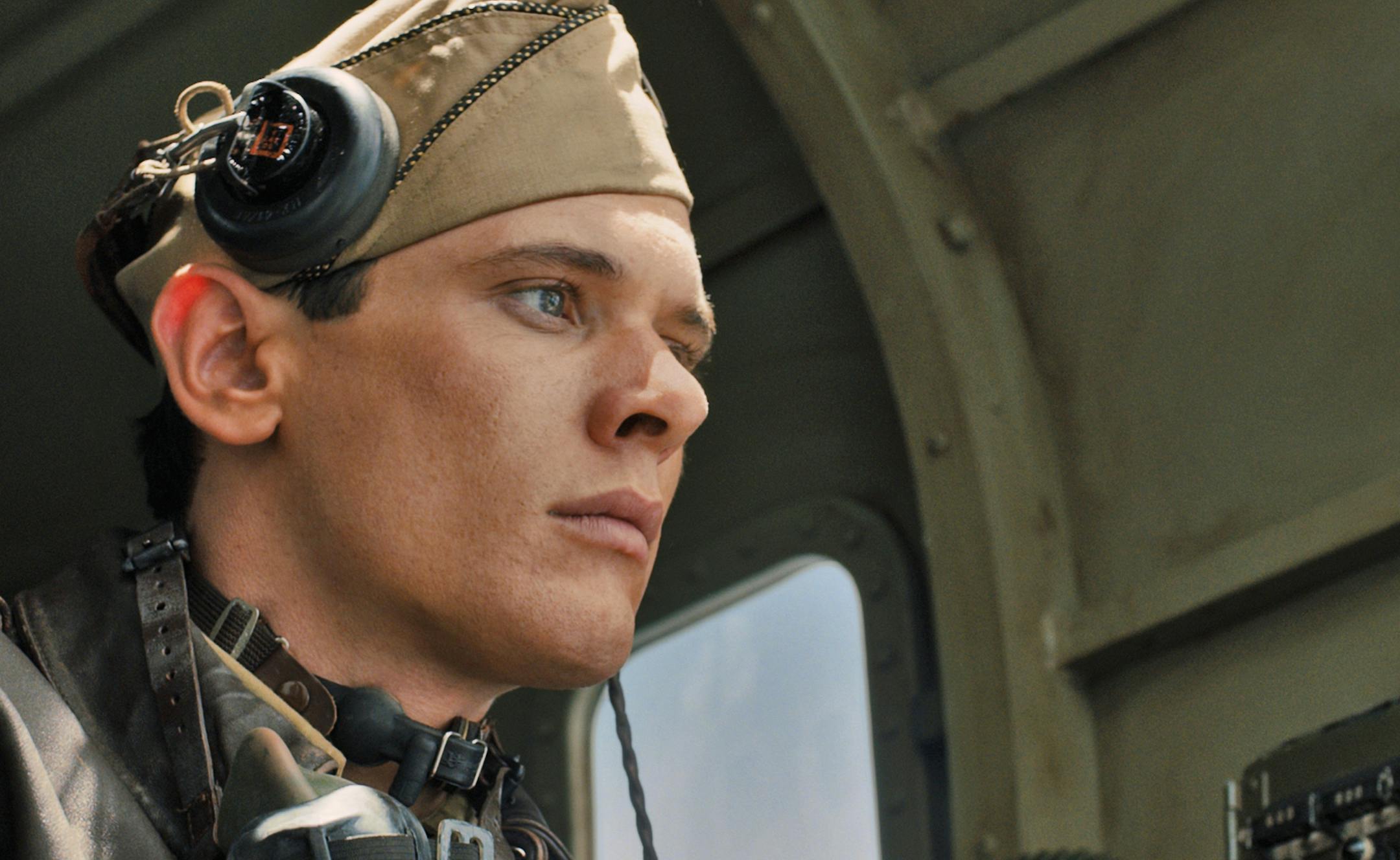In this image released by Universal Pictures, Jack O'Connell portrays Olympian and war hero Louis "Louie" Zamperini in a scene from "Unbroken." (AP Photo/Universal Pictures)