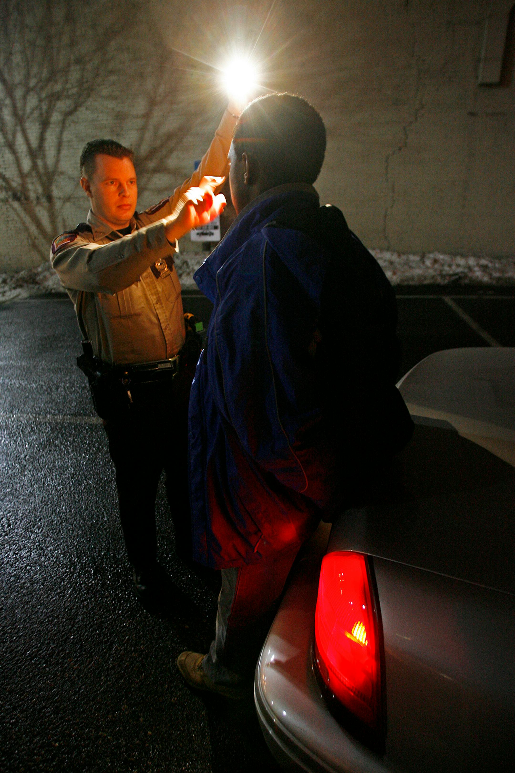 Schroepfer patrols Twin Cities streets and expressways looking for signs of drunken-driving offenses, which typically increase the weekend before Christmas.