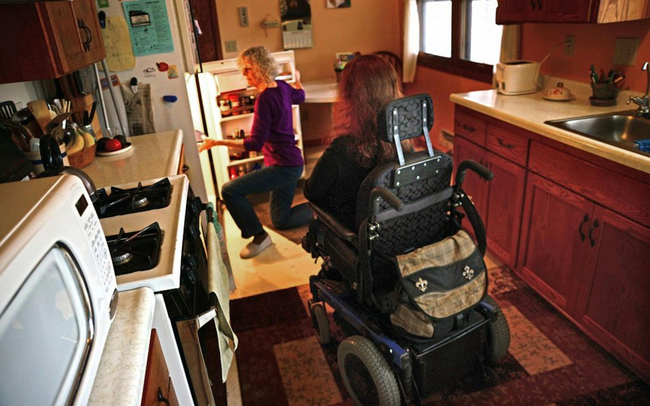 Terry Hagenah, a retired nurse from Plymouth, helps care for her 38-year-old daughter, Jessica, who has muscular dystrophy.