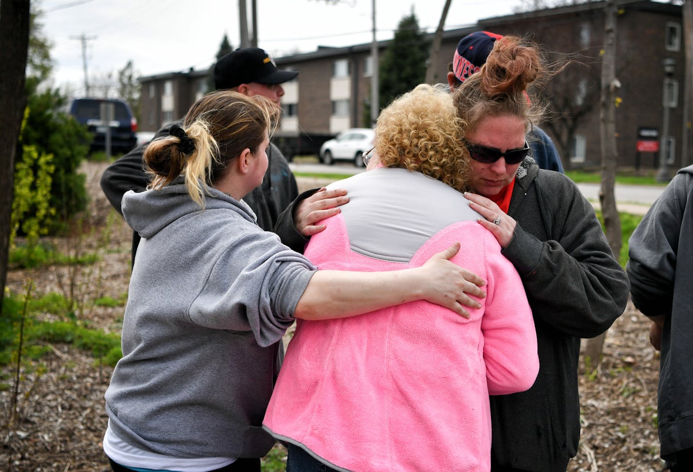 Family members of Ryan Reeves, 32, who died after his car hit a tree at the end of a police chase, gathered here at the place where he died near the corner of Hamline Ave N and Wynne Ave.St. Paul. Reeves mother Tracy Reeves is in the middle of the group. ] GLEN STUBBE &#xef; glen.stubbe@startribune.com Monday April 24, 2017 Police chase ends with man in car hitting a tree and dying. We get color from the scene.
The crash occurred about 8 p.m. Sunday near Hamline and Wynne avenues, according to a