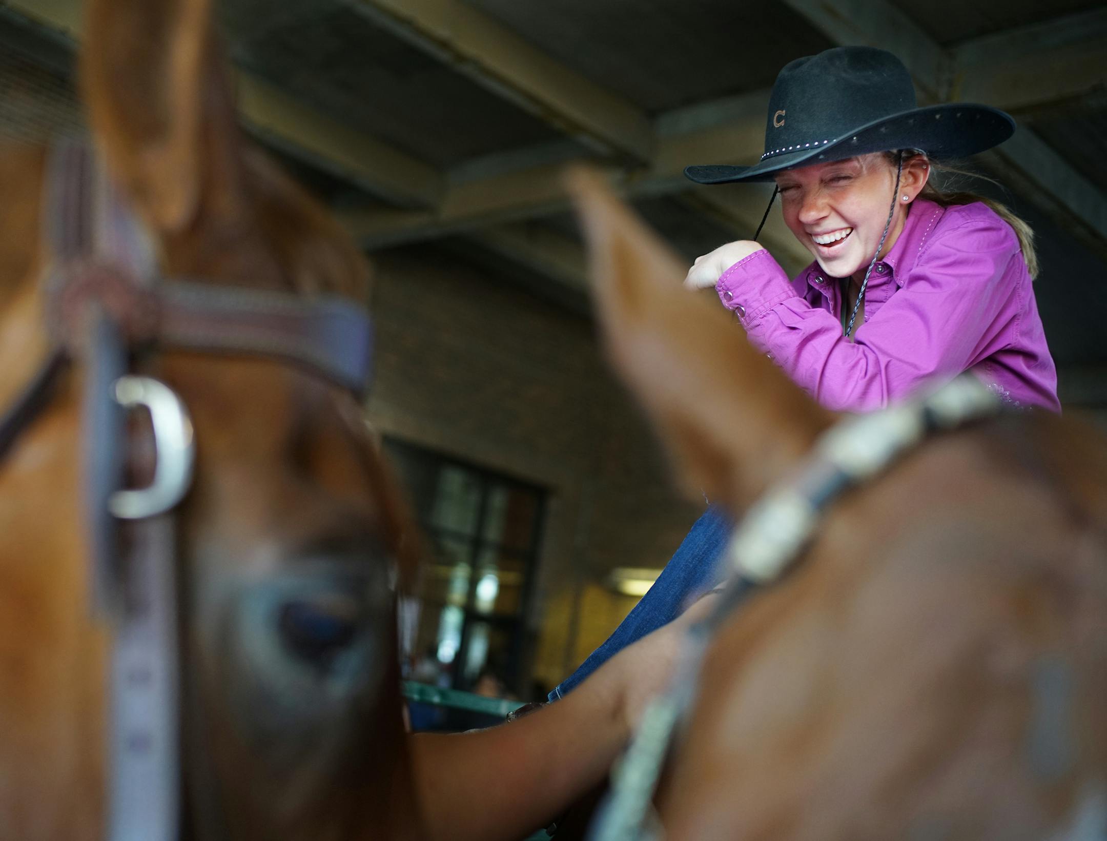 Michelle Sparks,26, aboard her quarter horse Lucky as took a break between events. She is competing with her sister Bree in the Western Saddle Club Association. Temperatures reached the mid-80's at the Minnesota State Fair as it concludes tomorrow on Labor Day. ]Richard Tsong-Taatarii ï richard.tsong-taatarii@startribune.com
