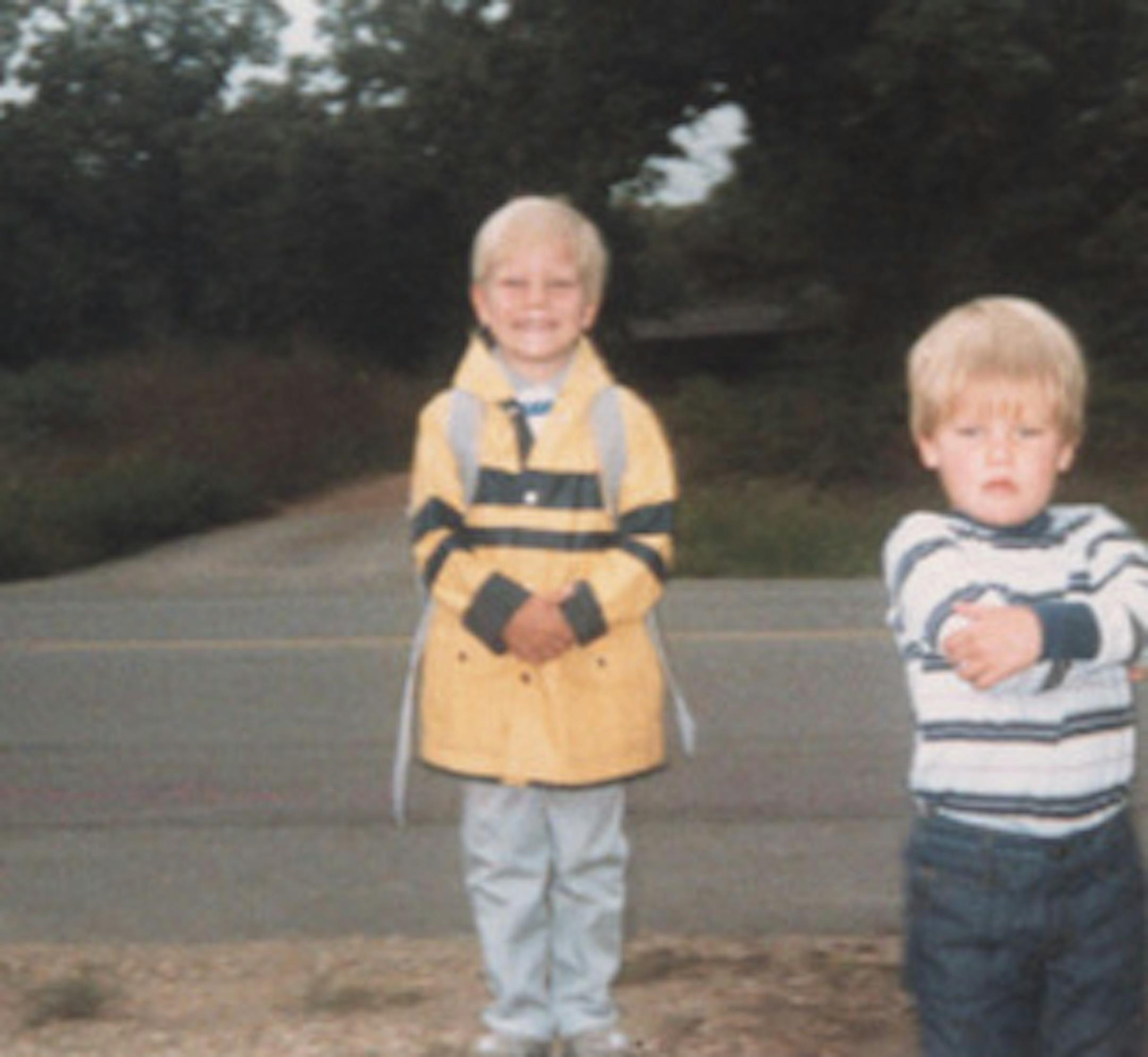 Sandra Sorensen, Shakopee
Every fall, this day in 1986 comes to mind. My oldest, Tom, was all set for his new adventure in Kindergarten! Needless to say, his younger brother, Aaron, not so much. Apparently he was not a fan of being left behind and made no bones about it. To prove his point, Aaron stayed in the driveway on his play tractor all afternoon until that bus brought his brother back home. Very tender memories! And yet, I still find the photo hysterical.