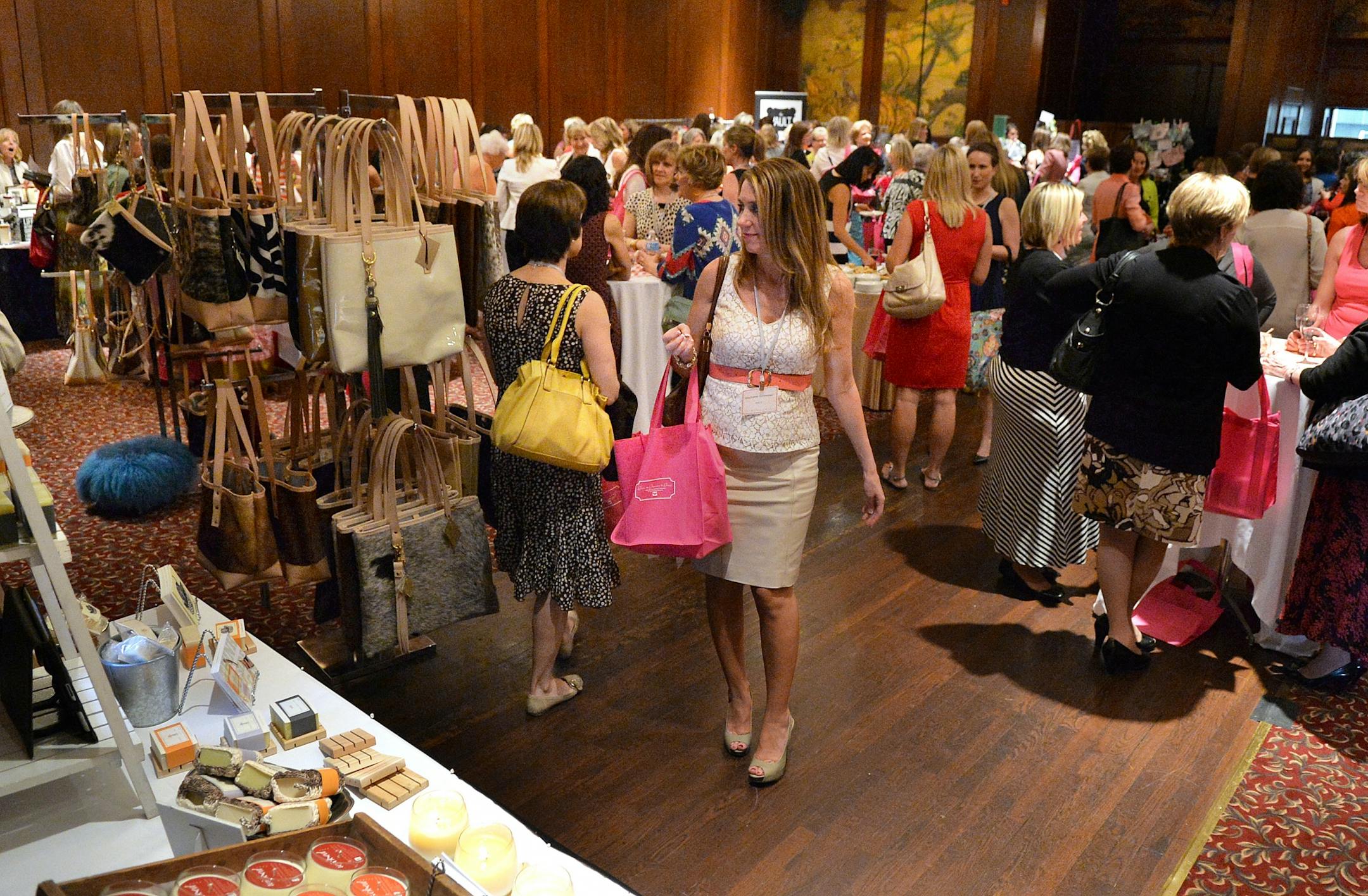 Vendors set up shop at the Metropolitan Ballroom in Golden Valley selling various clothing items, jewelry and home goods.