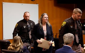 Jennifer Crumbley, 43, the mother of accused Oxford High School gunman Ethan Crumbley, exited the courtroom of Oakland County Court in Pontiac, Michig