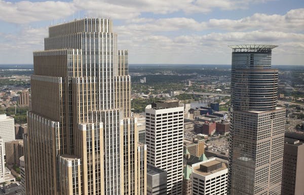 The Wells Fargo Center is shown at left in this photo of the downtown Minneapolis skyline taken in 2011.