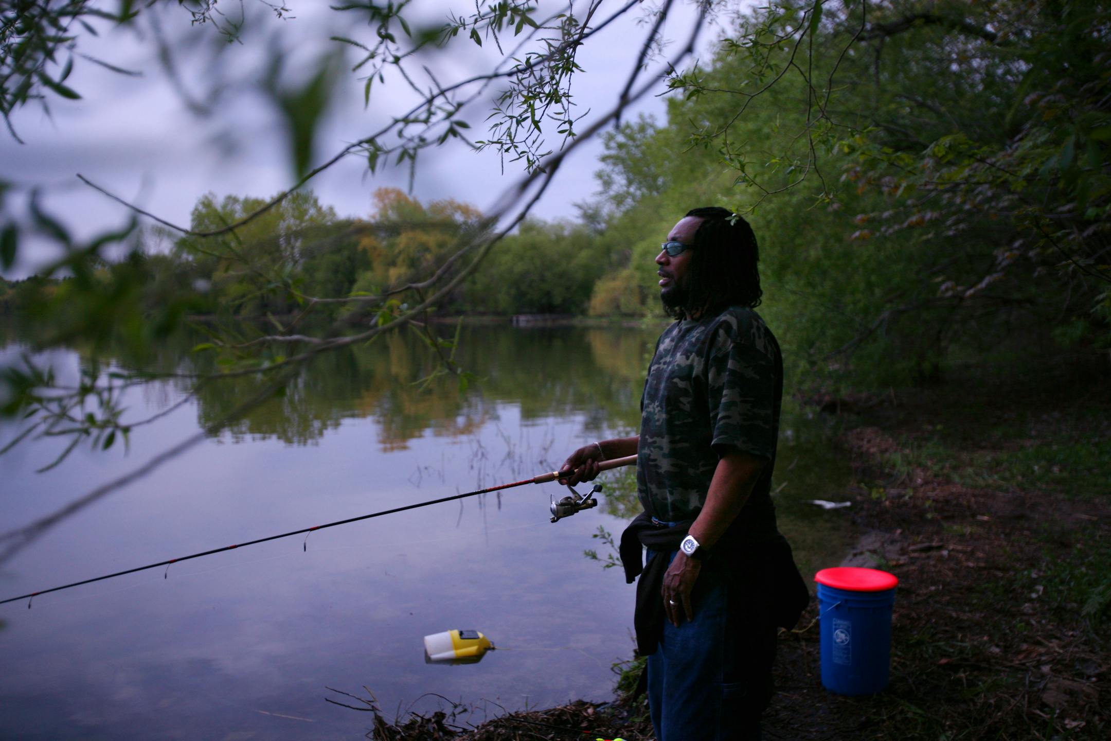 Walter Cooper fished at Lake Nokomis in Minneapolis Thursday. Cooper, who regularly fishes on the lake, caught a 28 inch walleye on Monday.