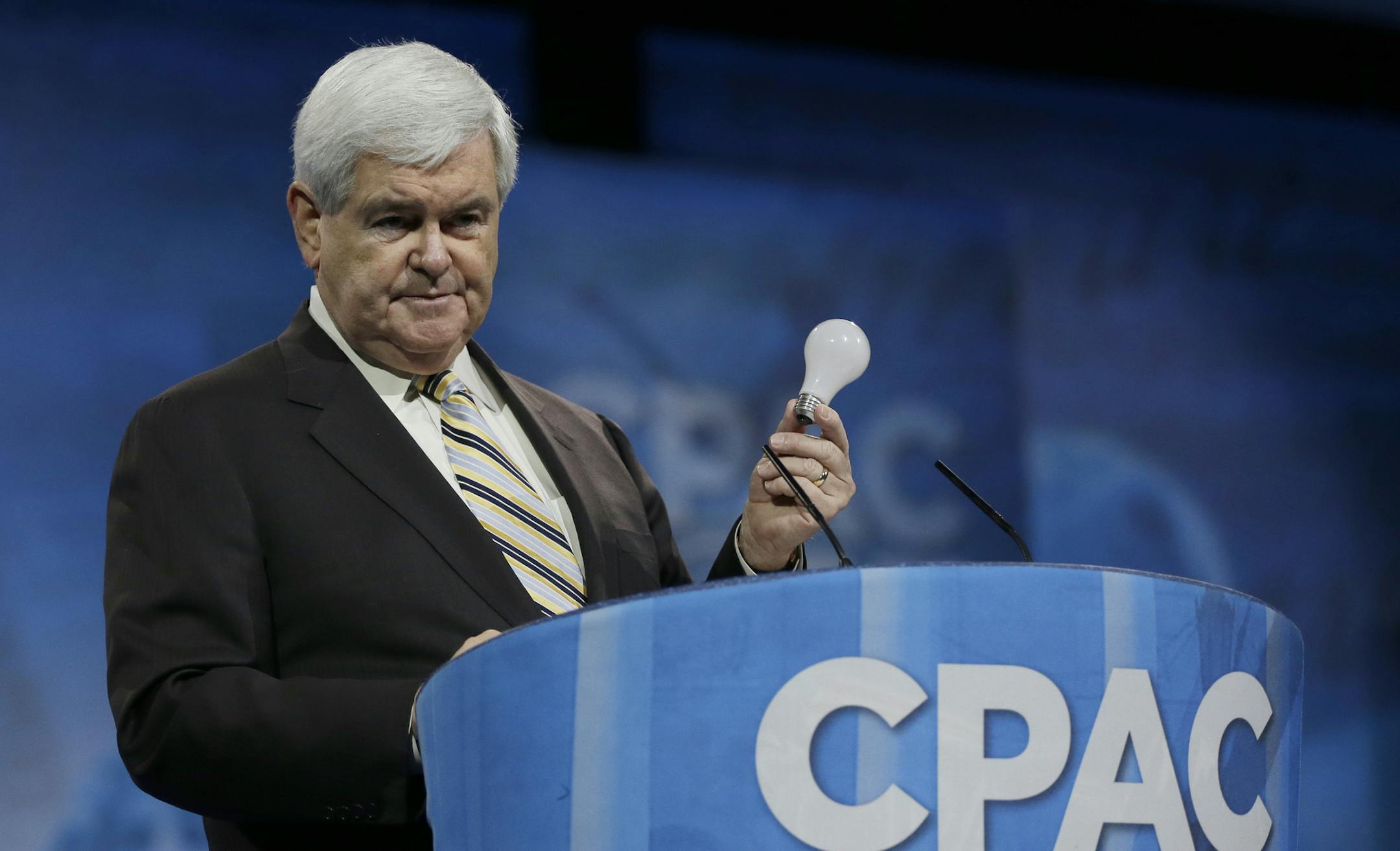 Former House Speaker Newt Gingrich holds a lightbulb as a prop while talking about innovation and Thomas Edison during the 40th annual Conservative Political Action Conference in National Harbor, Md., Saturday, March 16, 2013.