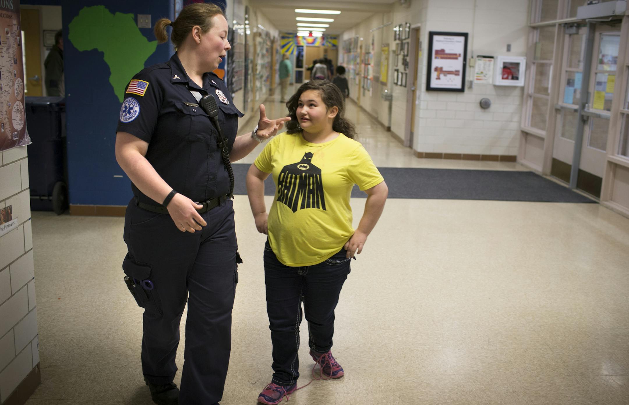 Reanna Timoshenko chatted with Columbia Heights firefighter Emily Cramble, her mentor with Big Brothers Big Sisters.