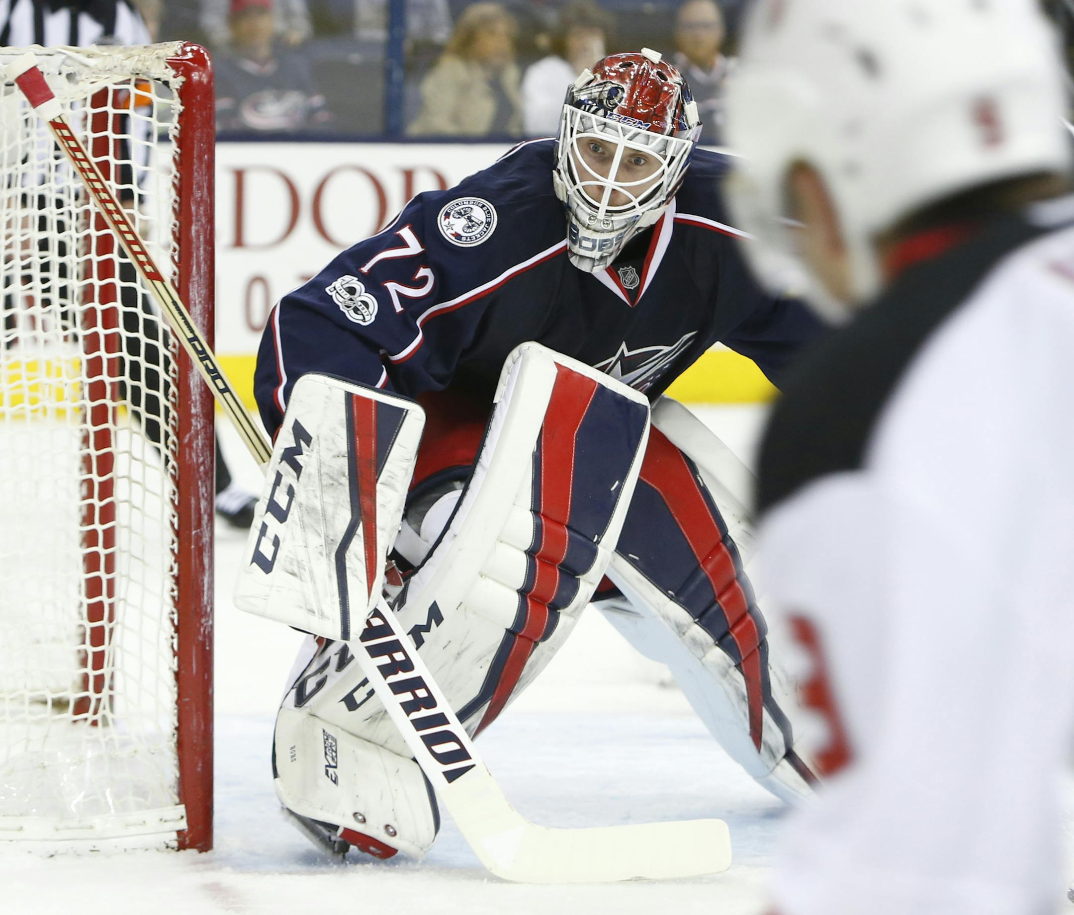 Columbus Blue Jackets' Sergei Bobrovsky, left, of Russia, watches for the shot from New Jersey Devils' Taylor Hall during the first period of an NHL hockey game Tuesday, March 7, 2017, in Columbus, Ohio. The Blue Jackets defeated the Devils 2-0. (AP Photo/Jay LaPrete)