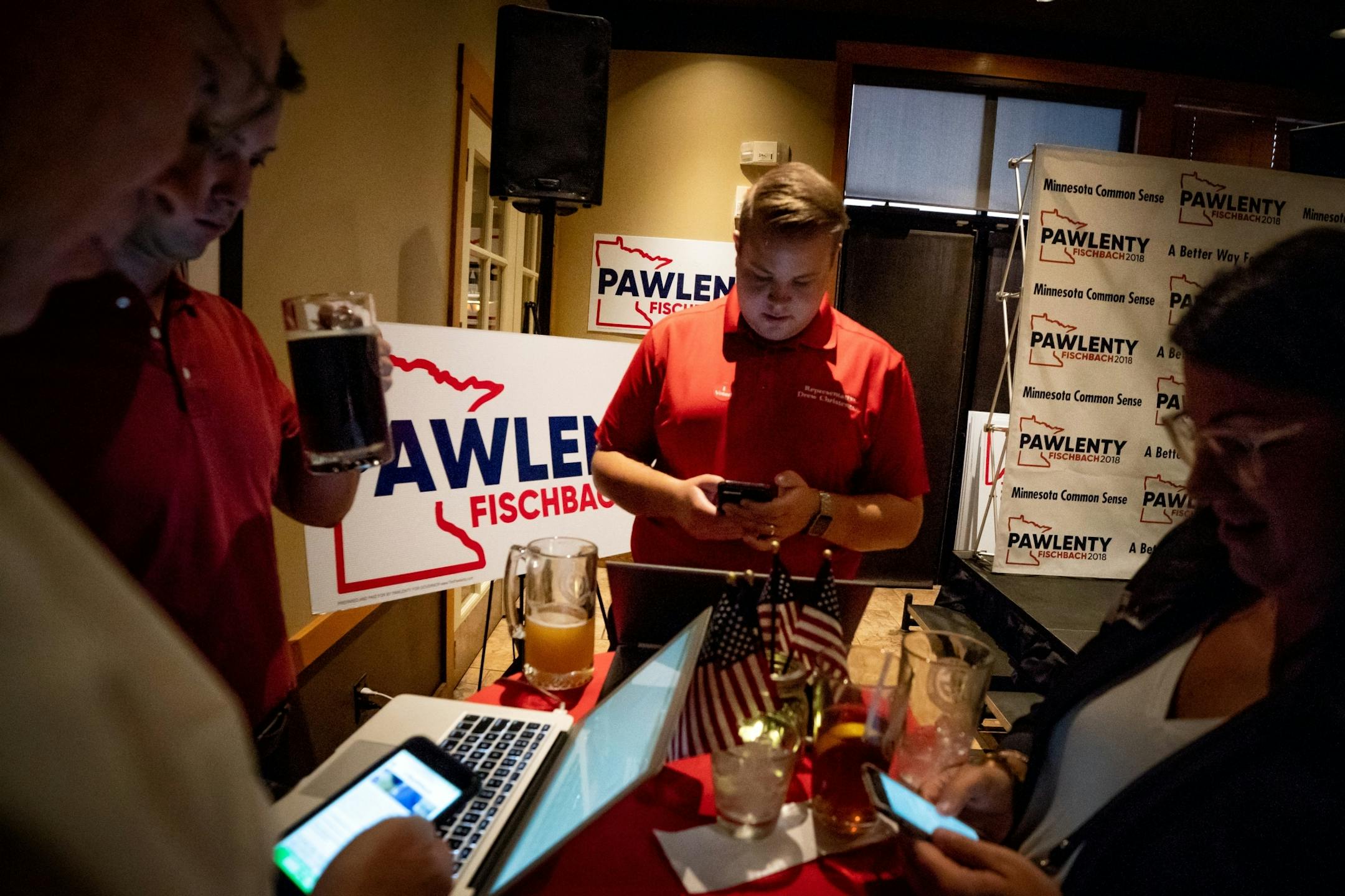 Tim Pawlenty supporters checked early results at his election night gathering at Granite City Food and Brewery in Eagan.