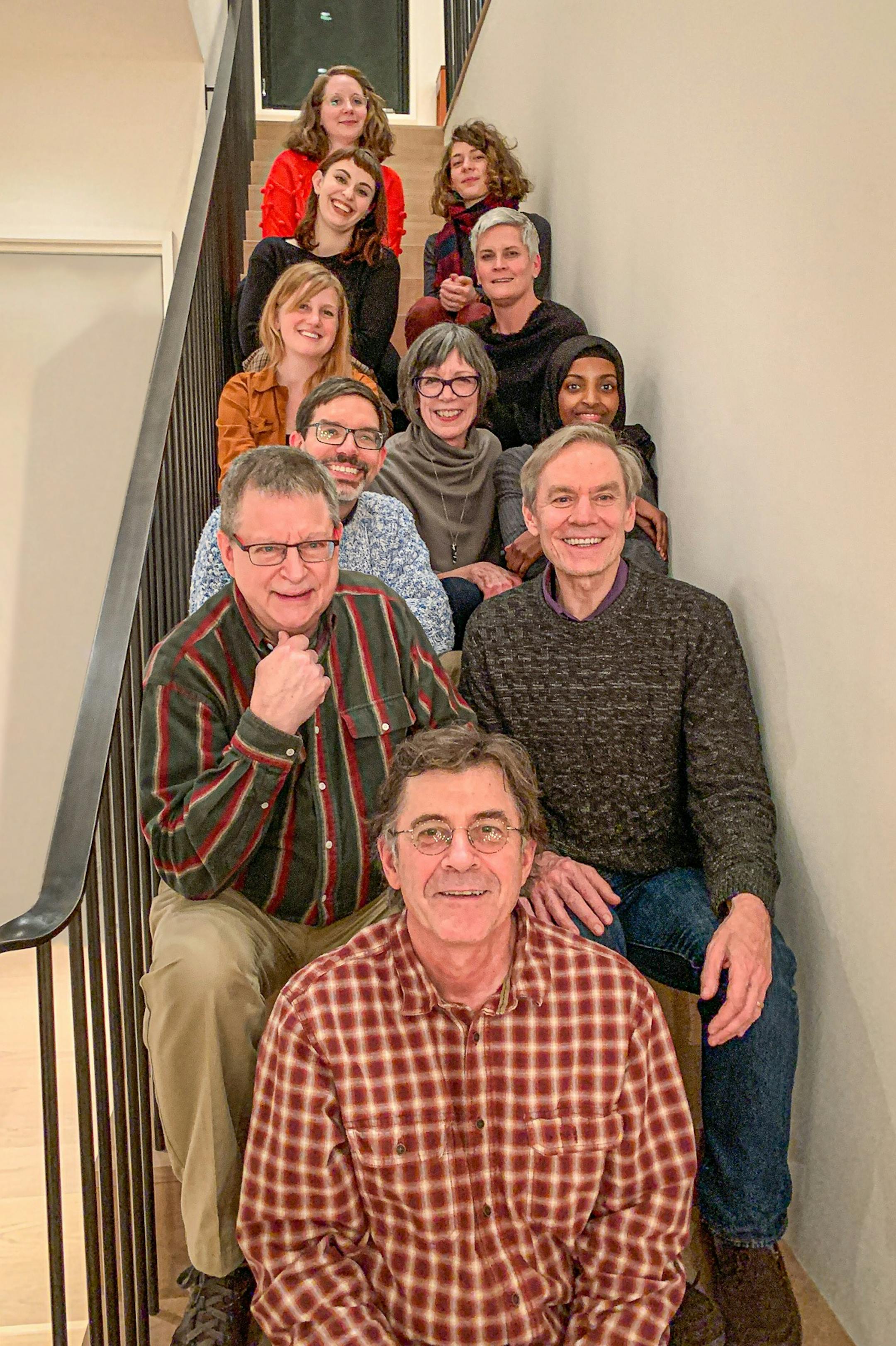 John Coy, Gaylord Schanilec and the other artists who worked on "My Mighty Journey: A Waterfall's Story." Winners of the 2020 Minnesota Book Artist Award. Pictured from front to back: Gaylord Schanilec, Hans Koch, John Coy, Paul Nylander, Barbara Eijadi, Rayan Macalin, Paris Fobbe, Monica Edwards Larson, Sorcha Douglas, Greta Lapcinski, Kerri Mulcare