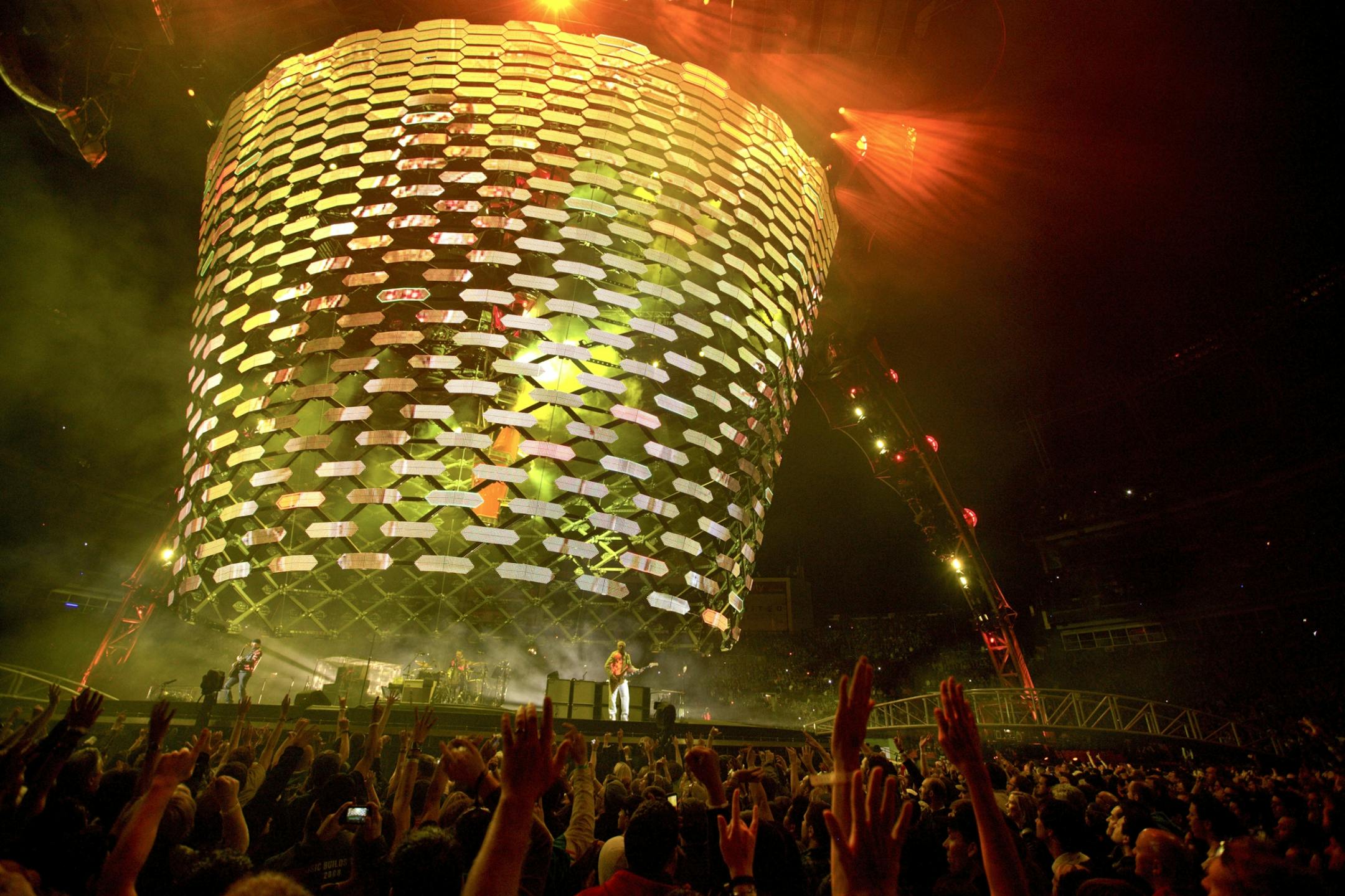 (EXCLUSIVE, Premium Rates Apply) (EXCLUSIVE COVERAGE) (EXCLUSIVE COVERAGE) U2 performs at INVESCO Field at Mile High on May 21, 2011 in Denver, Colorado.