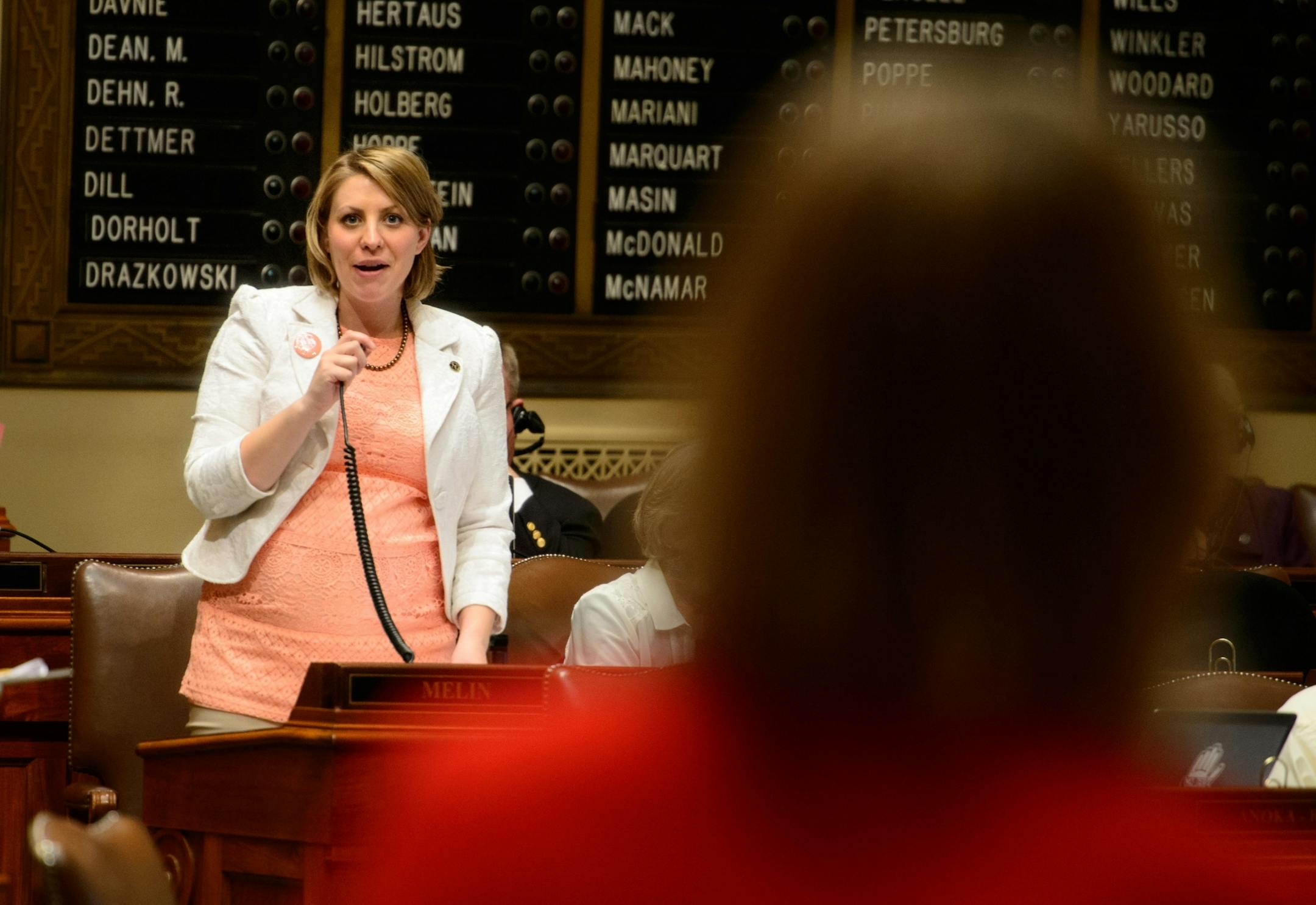 Rep. Carly Melin, DFL-Hibbing defended her Women's Economic Security Act bill on the House floor with Rep. Sarah Anderson, R-Plymouth