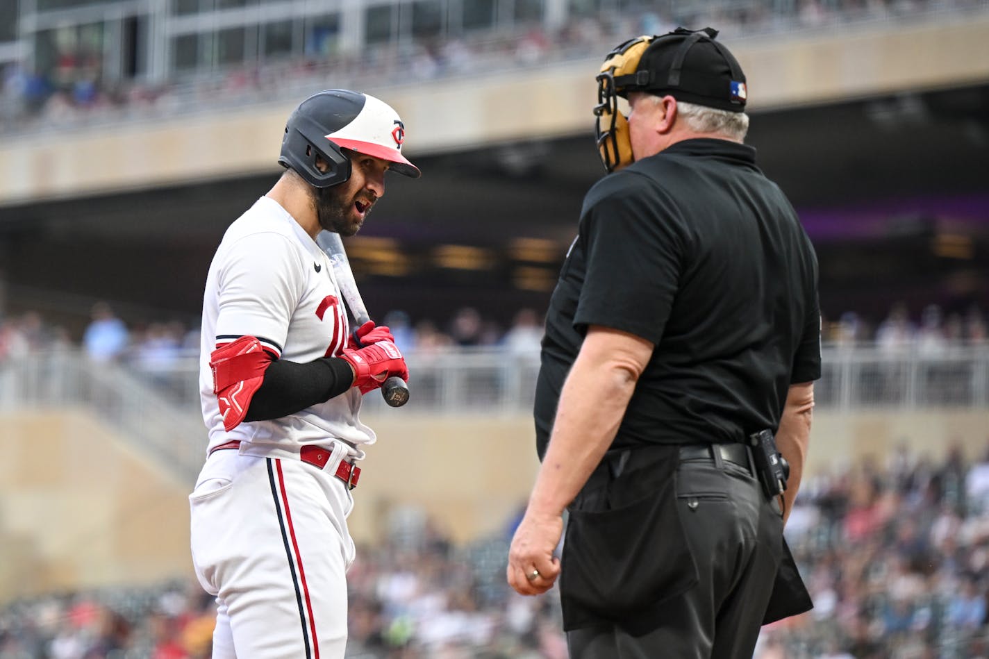 Minnesota Twins left fielder Joey Gallo (13) argues a strike out call with home plate umpire Bill Biller in the bottom of the second inning against the Seattle Mariners Tuesday, July 25, 2023 at Target Field in Minneapolis, Minn.. ] AARON LAVINSKY • aaron.lavinsky@startribune.com