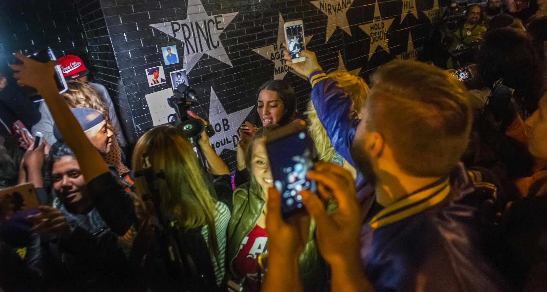 At First Ave where "Purple Rain" was filmed, fans of Prince paid tribute to the pop icon who passed away.