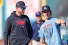Joe Ryan, right, talks with manager Rocco Baldelli before the Twins played Cleveland earlier this month.