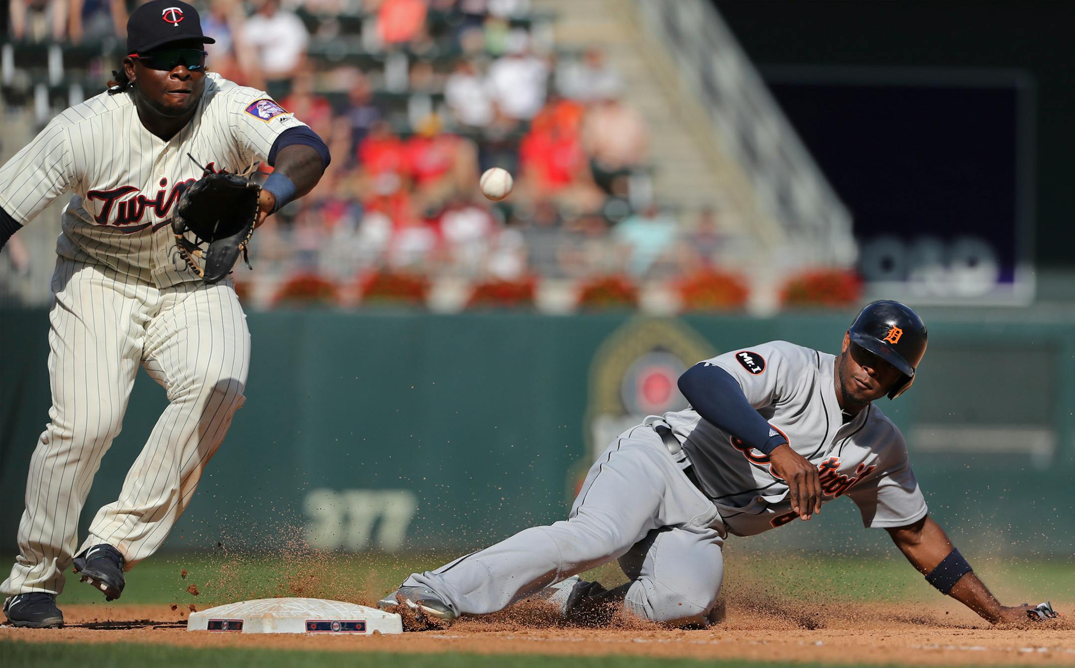 Detroit's Justin Upton was safe stealing third base in the ninth inning, arriving ahead of the throw to Miguel Sano. ] Twins vs Tigers at Target Field on 7/23/17.Richard Tsong-Taatarii/Richard Tsong-taatarii@startribune.com