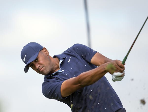 Tony Finau tees off on the fourth hole during the first round of the 3M Open golf tournament in Blaine, Minn., Thursday, July 23, 2020. (AP Photo/Andy